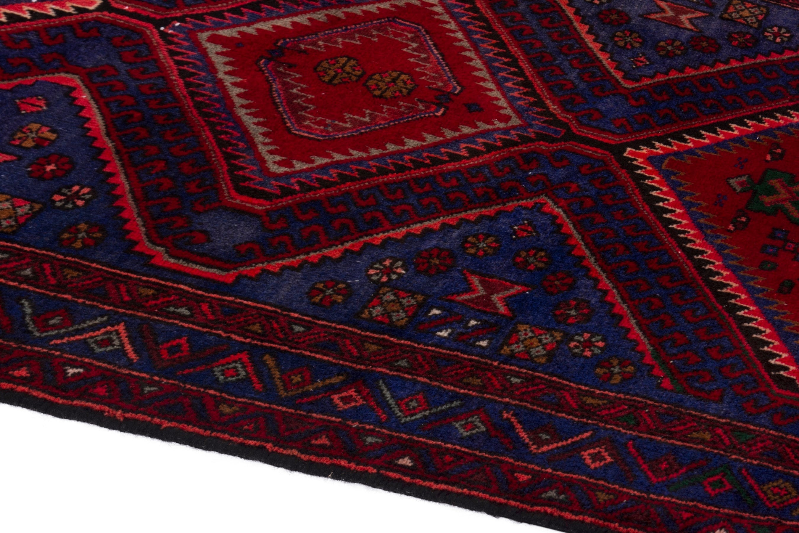 Persian Zanjan runner rug in deep red and dark blue, view 5 of 19