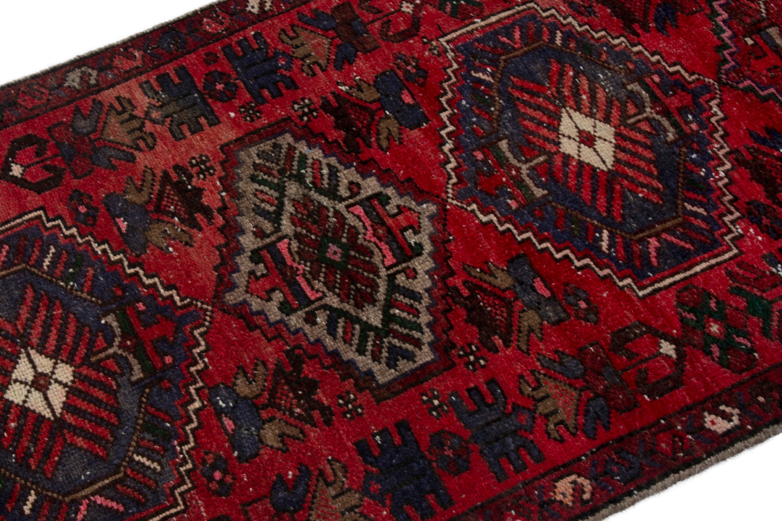 Persian Zanjan runner rug in deep red and navy, view 6 of 18