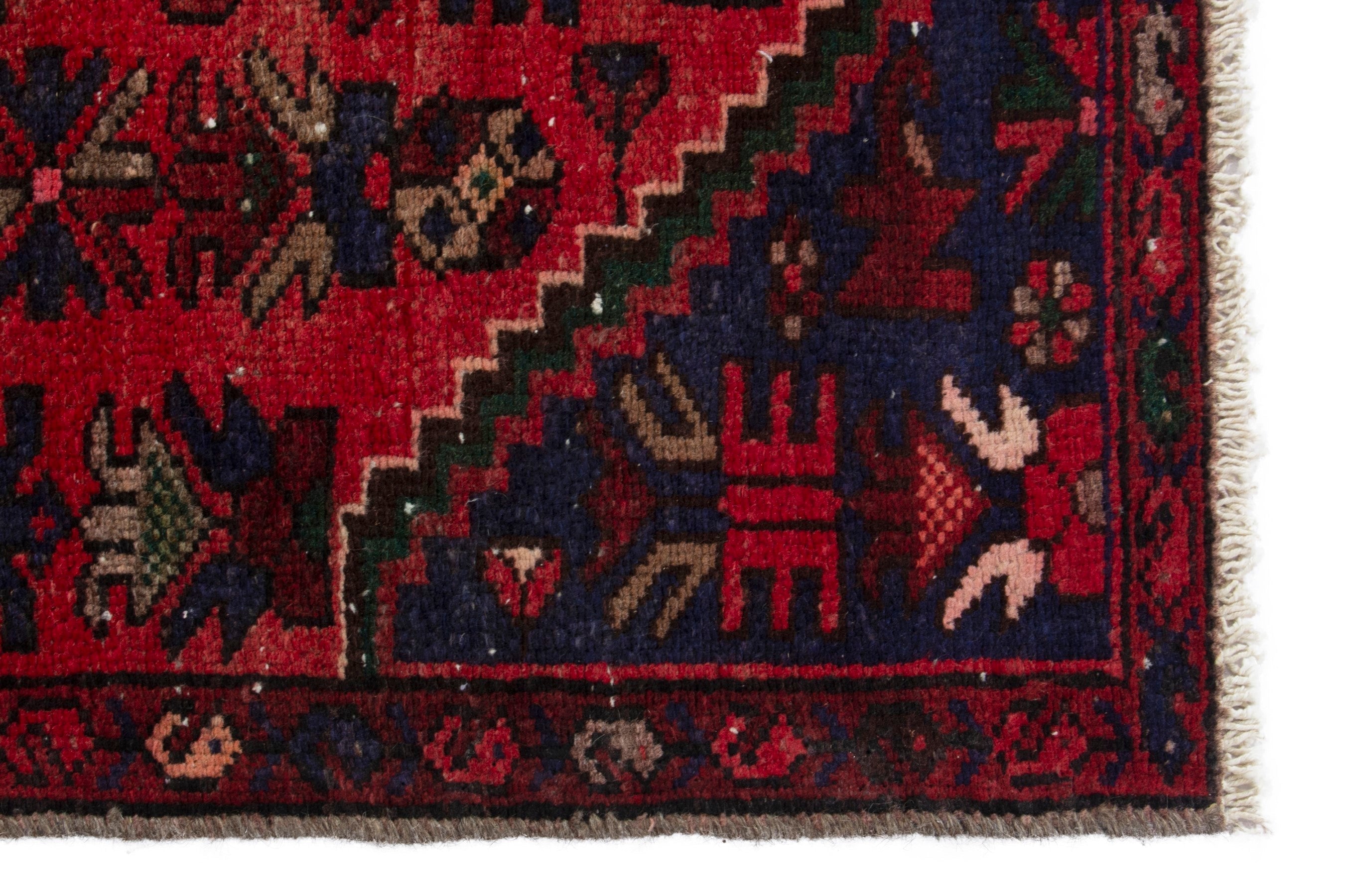 Persian Zanjan runner rug in deep red and navy, view 9 of 18
