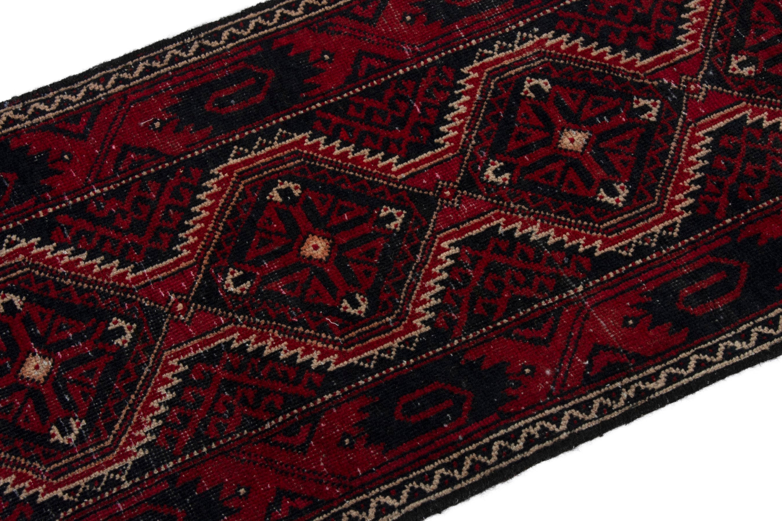 Persian Baluch accent rug in burgundy and deep red, view 5 of 15