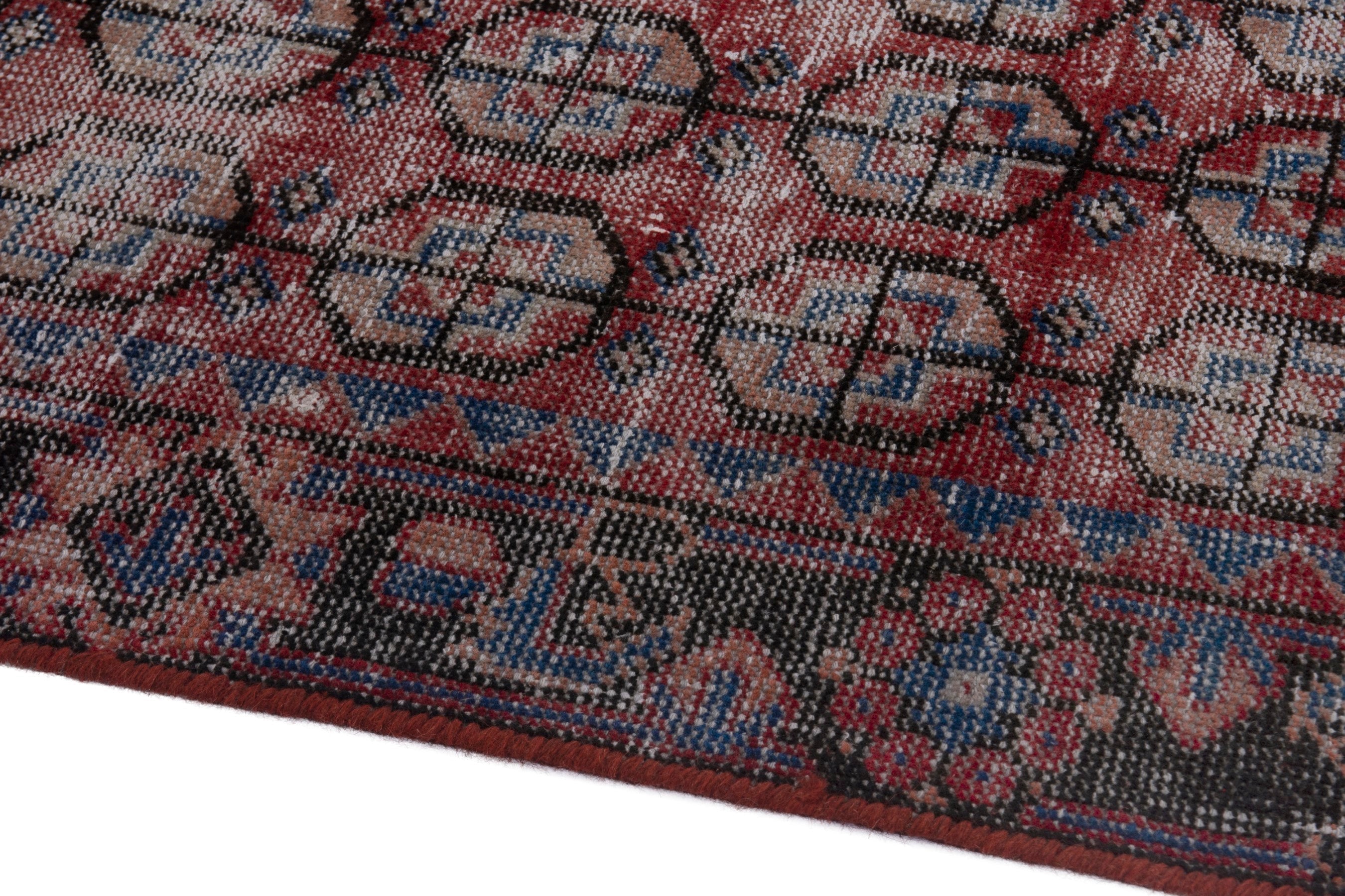 Persian Ferdos runner rug in burgundy and faded red, view 6 of 18