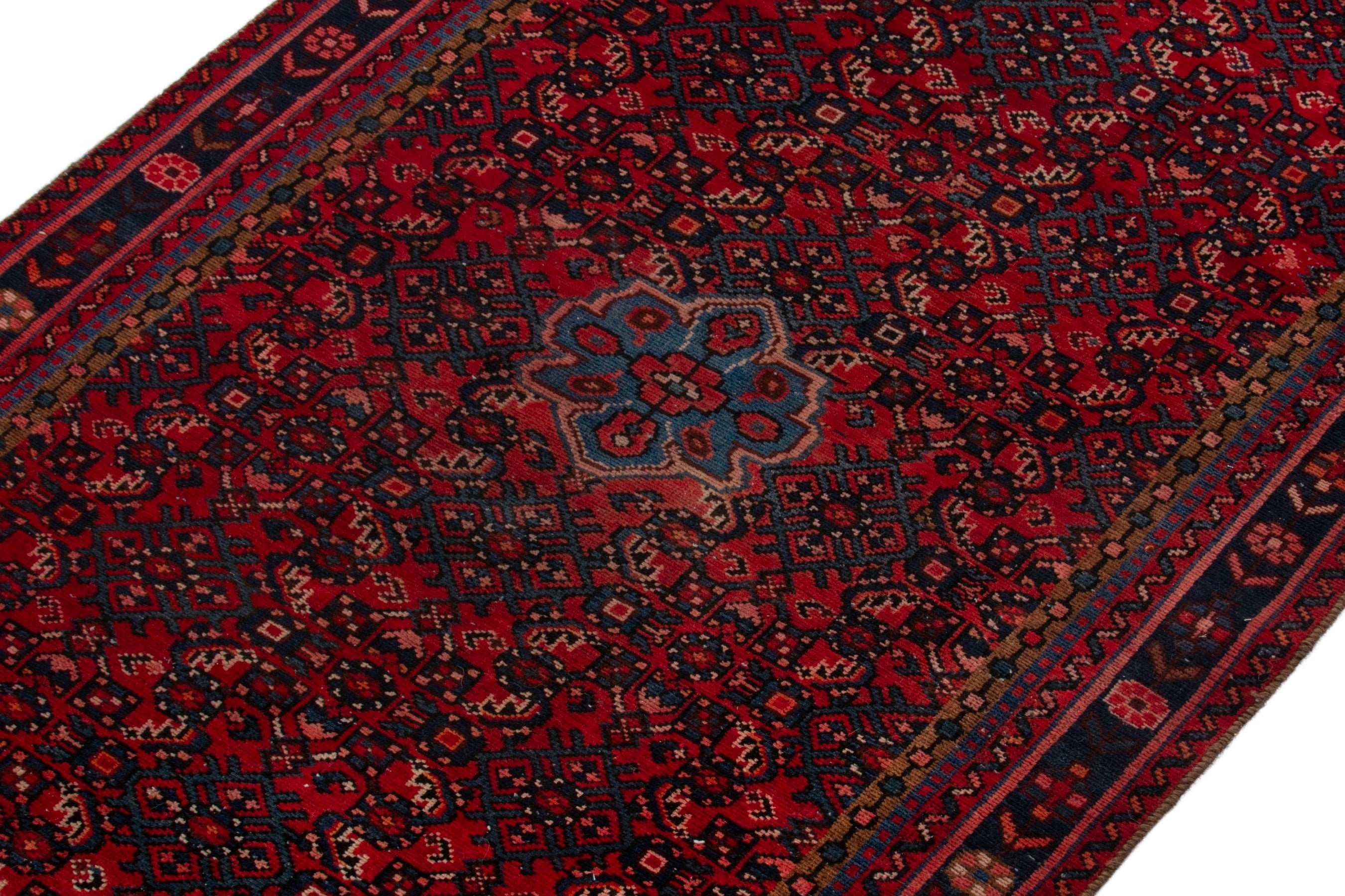 Persian Hosseinabad area rug in burgundy and dark blue, view 6 of 18