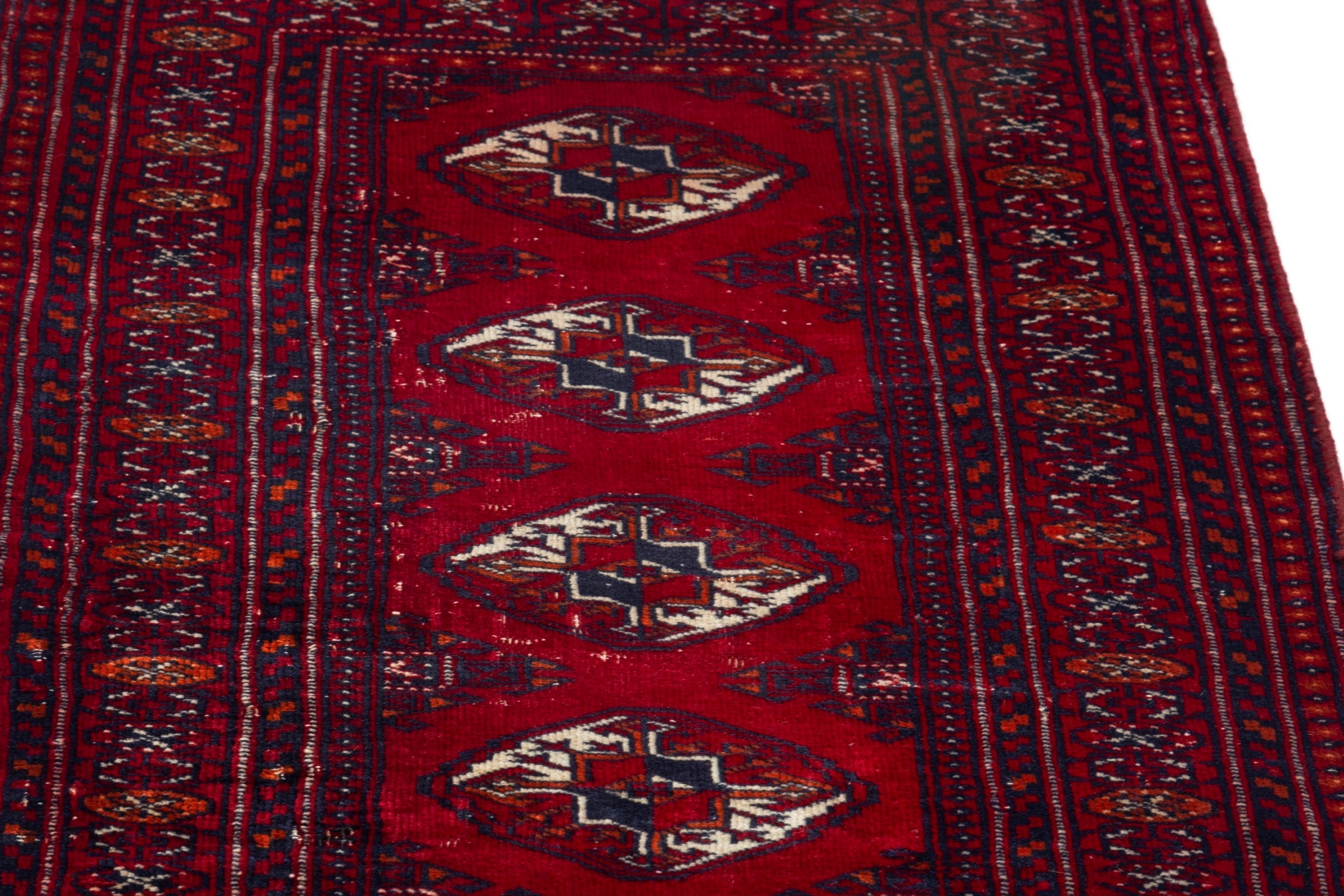 Persian Torkaman runner rug in deep red and burgundy, view 9 of 17