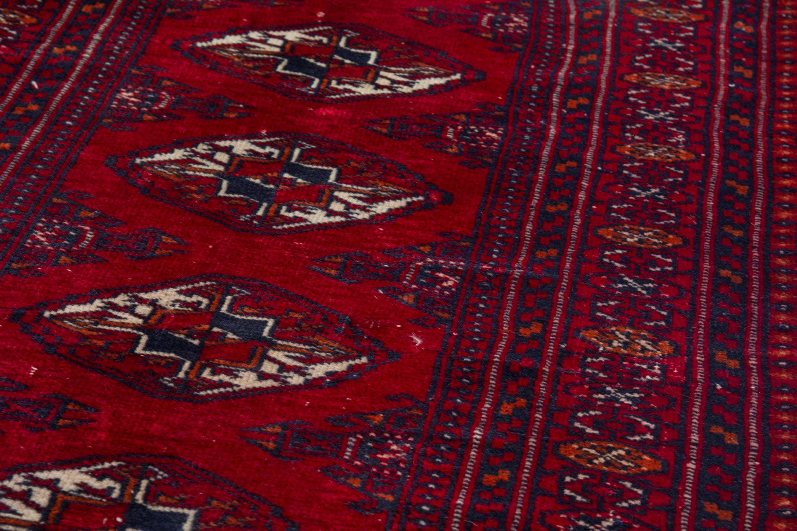 Persian Torkaman runner rug in deep red and burgundy, view 8 of 17