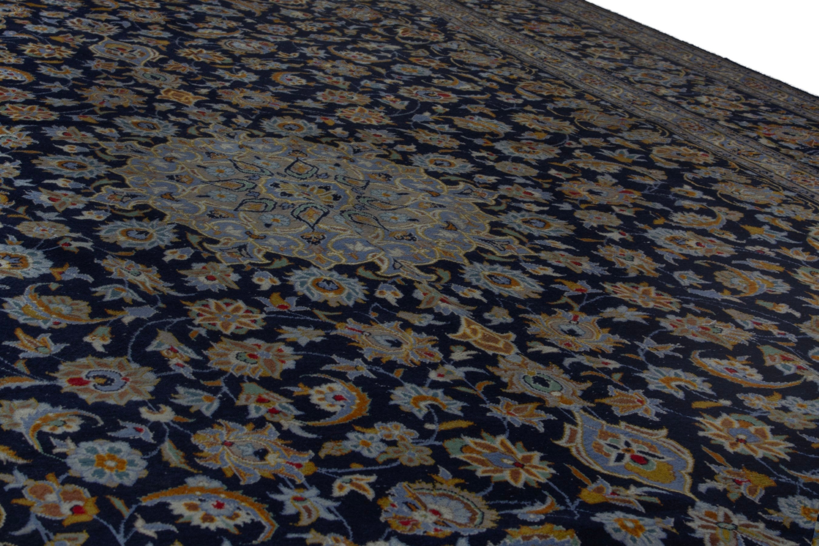 Persian Kashan oversized rug in navy and cream, view 10 of 19