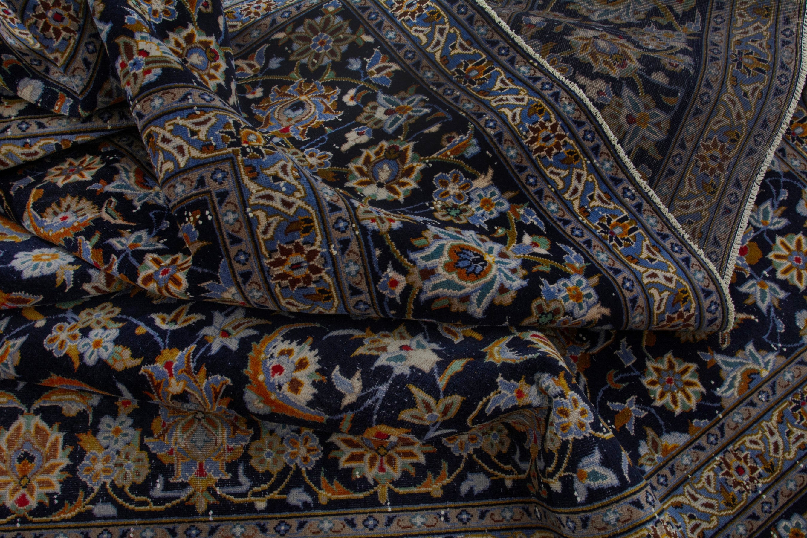 Persian Kashan oversized rug in navy and cream, view 17 of 19