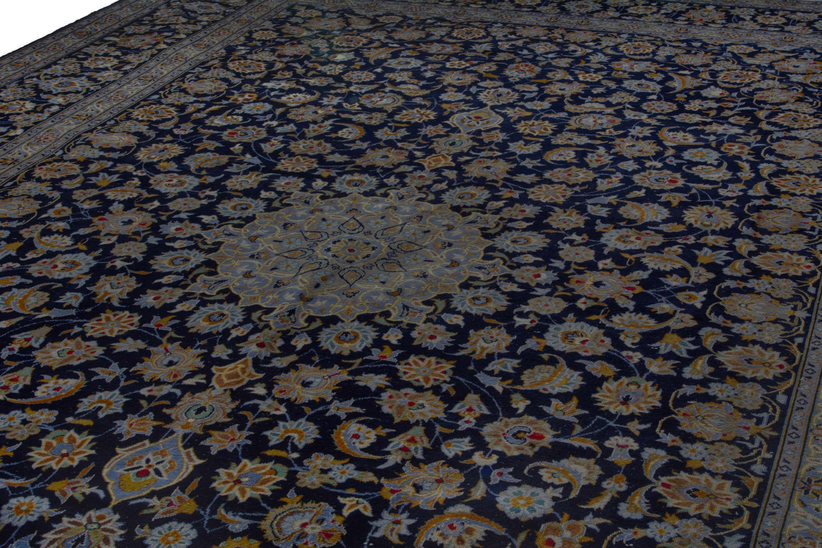 Persian Kashan oversized rug in navy and cream, view 9 of 19