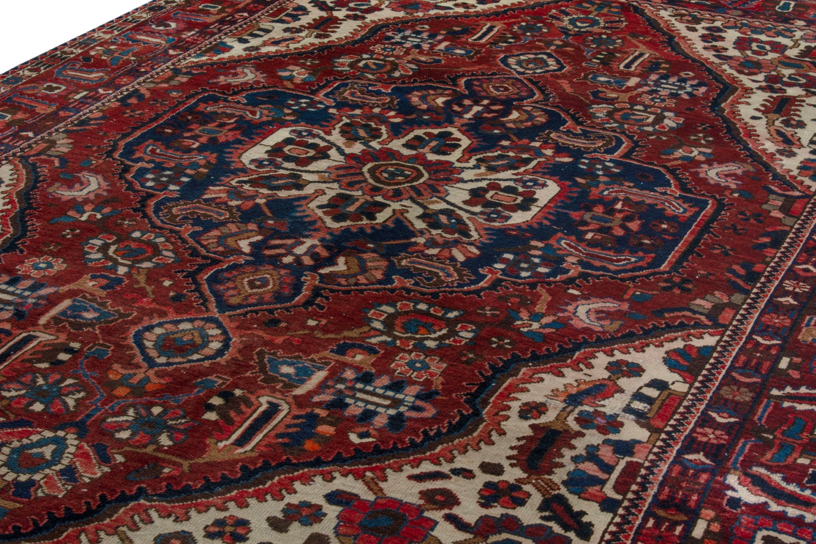Persian Bakhtiari area rug in deep red and burgundy, view 8 of 19