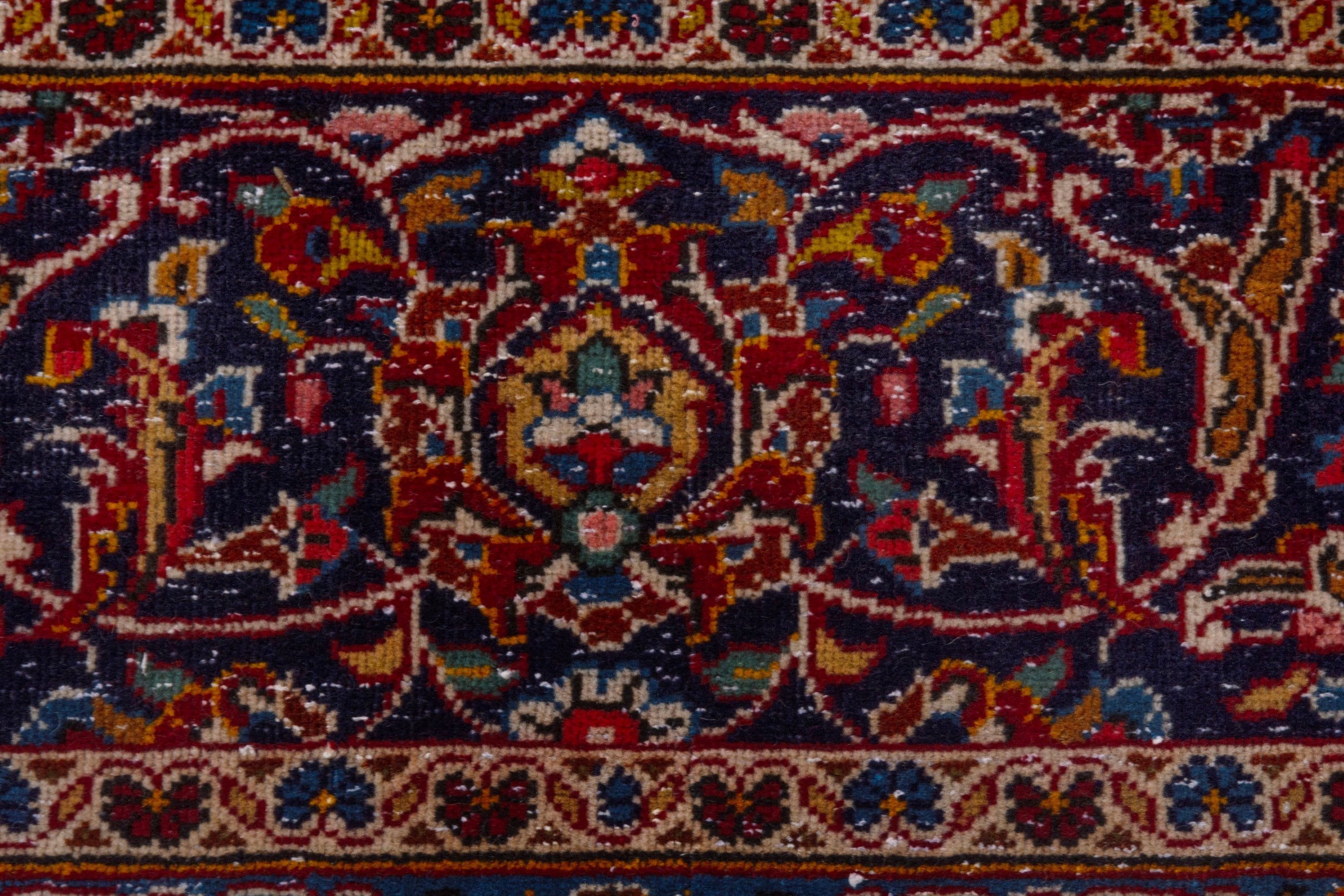 Persian Kashan oversized rug in deep red and dark blue, view 11 of 21