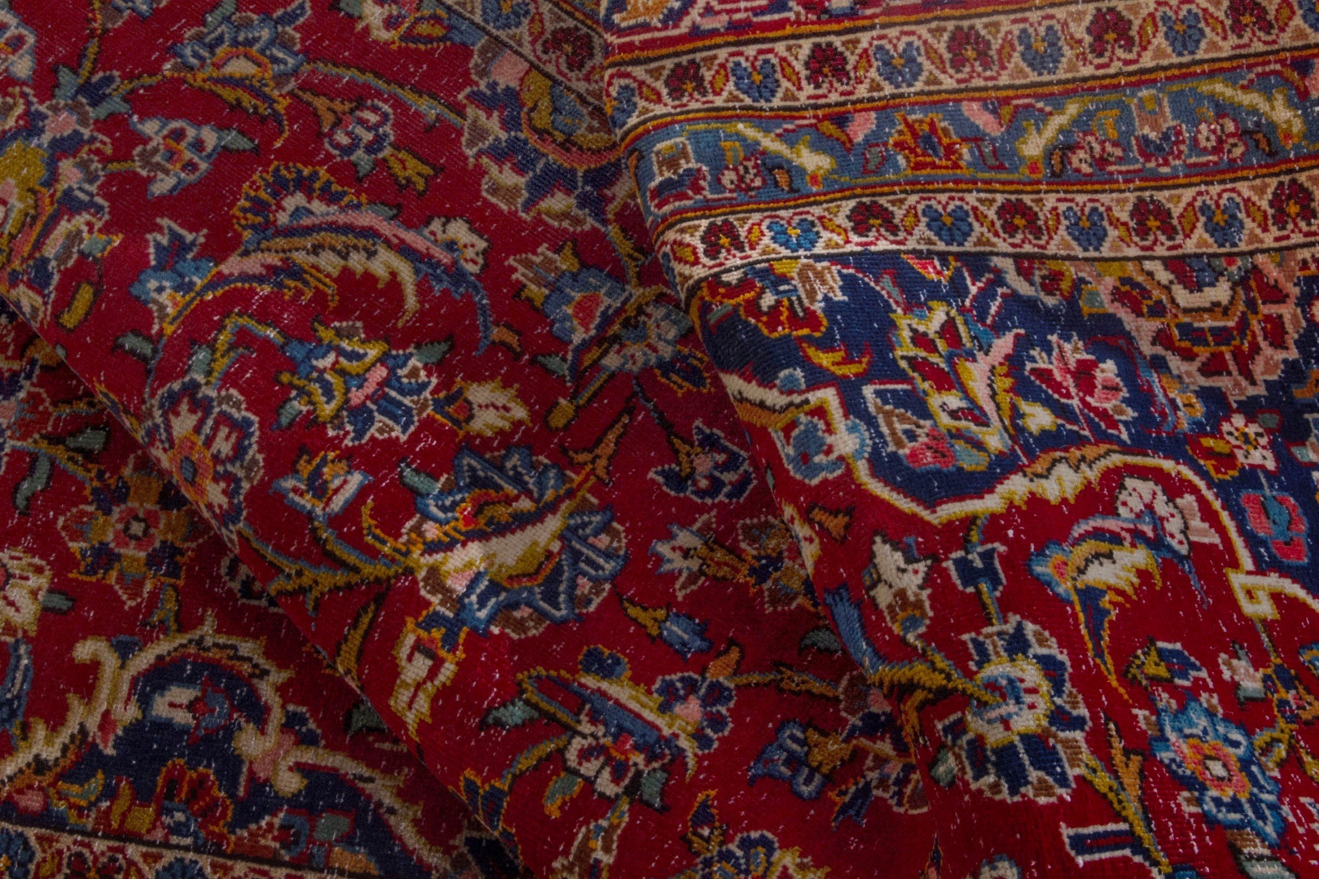 Persian Kashan oversized rug in deep red and dark blue, view 18 of 21