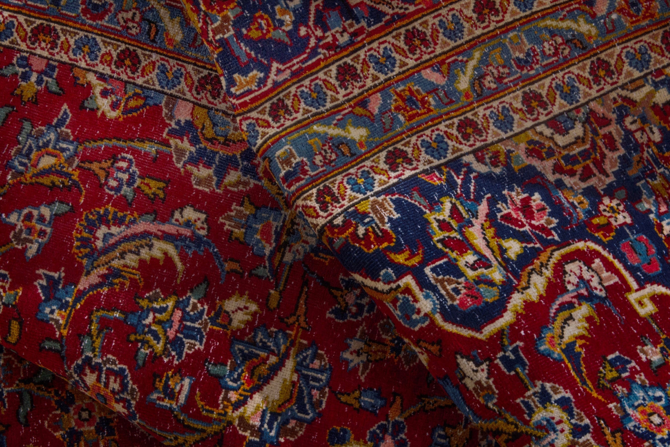Persian Kashan oversized rug in deep red and dark blue, view 19 of 21