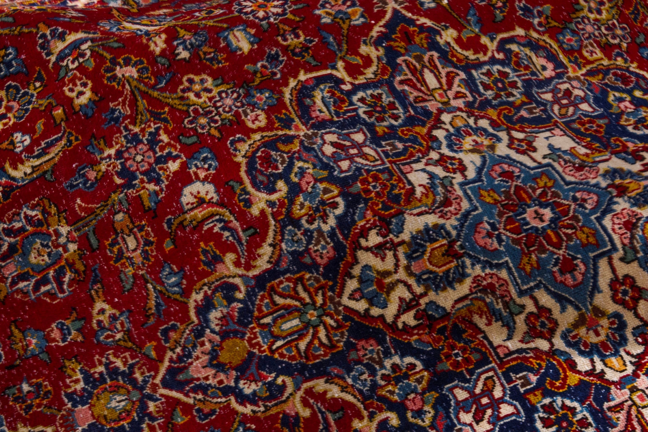 Persian Kashan oversized rug in deep red and dark blue, view 20 of 21