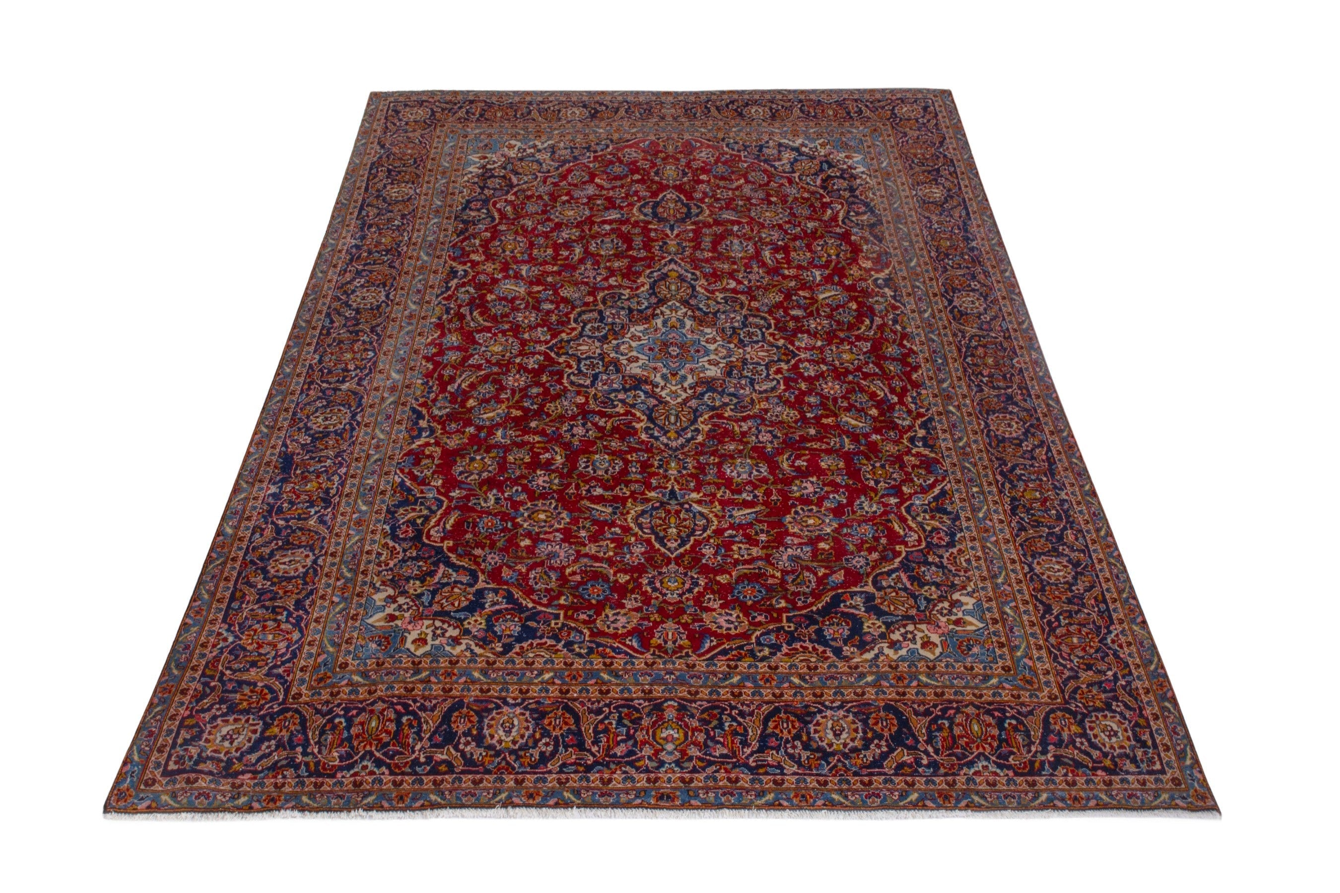 Persian Kashan oversized rug in deep red and dark blue, view 3 of 21