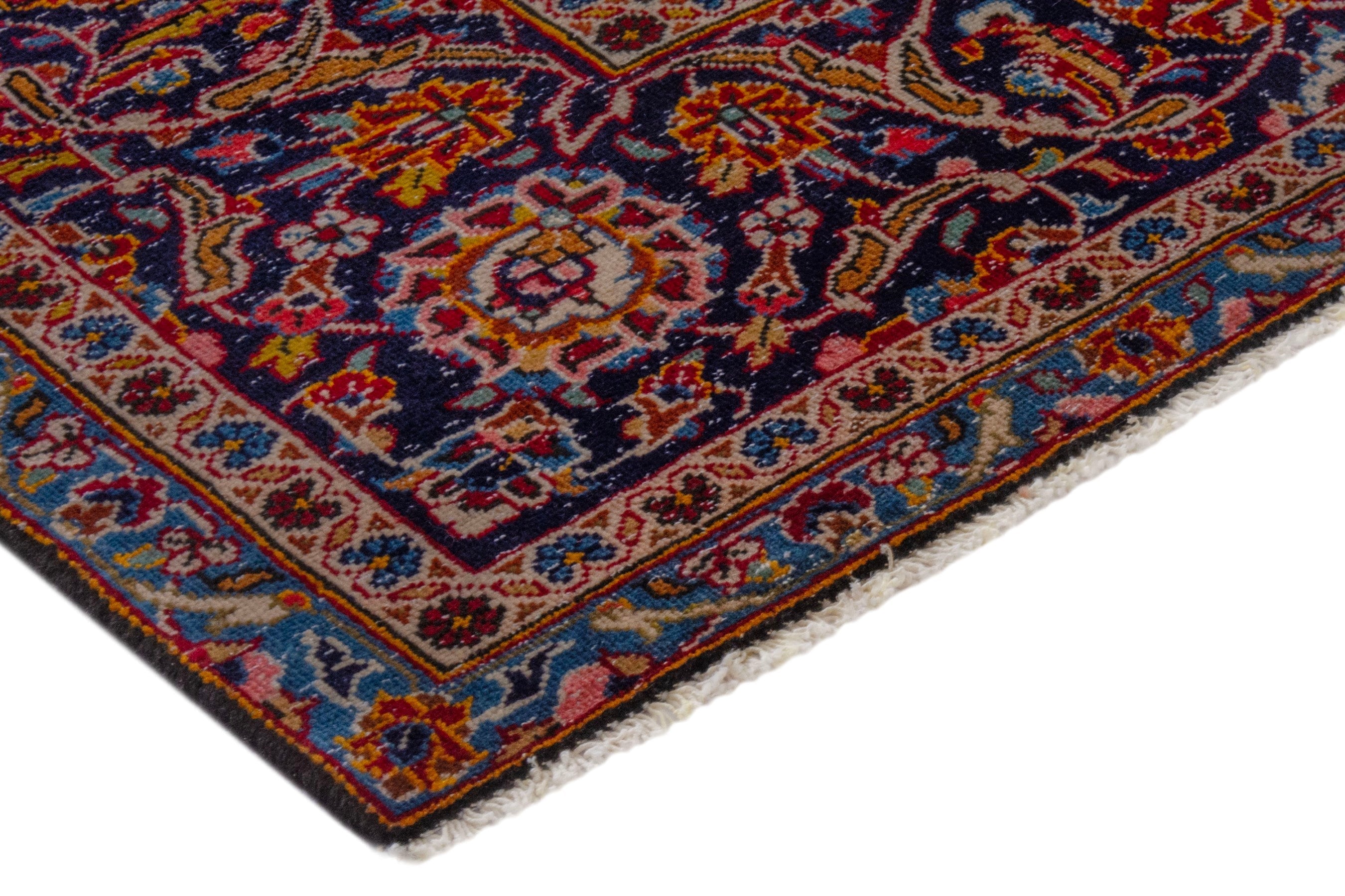 Persian Kashan oversized rug in deep red and dark blue, view 5 of 21