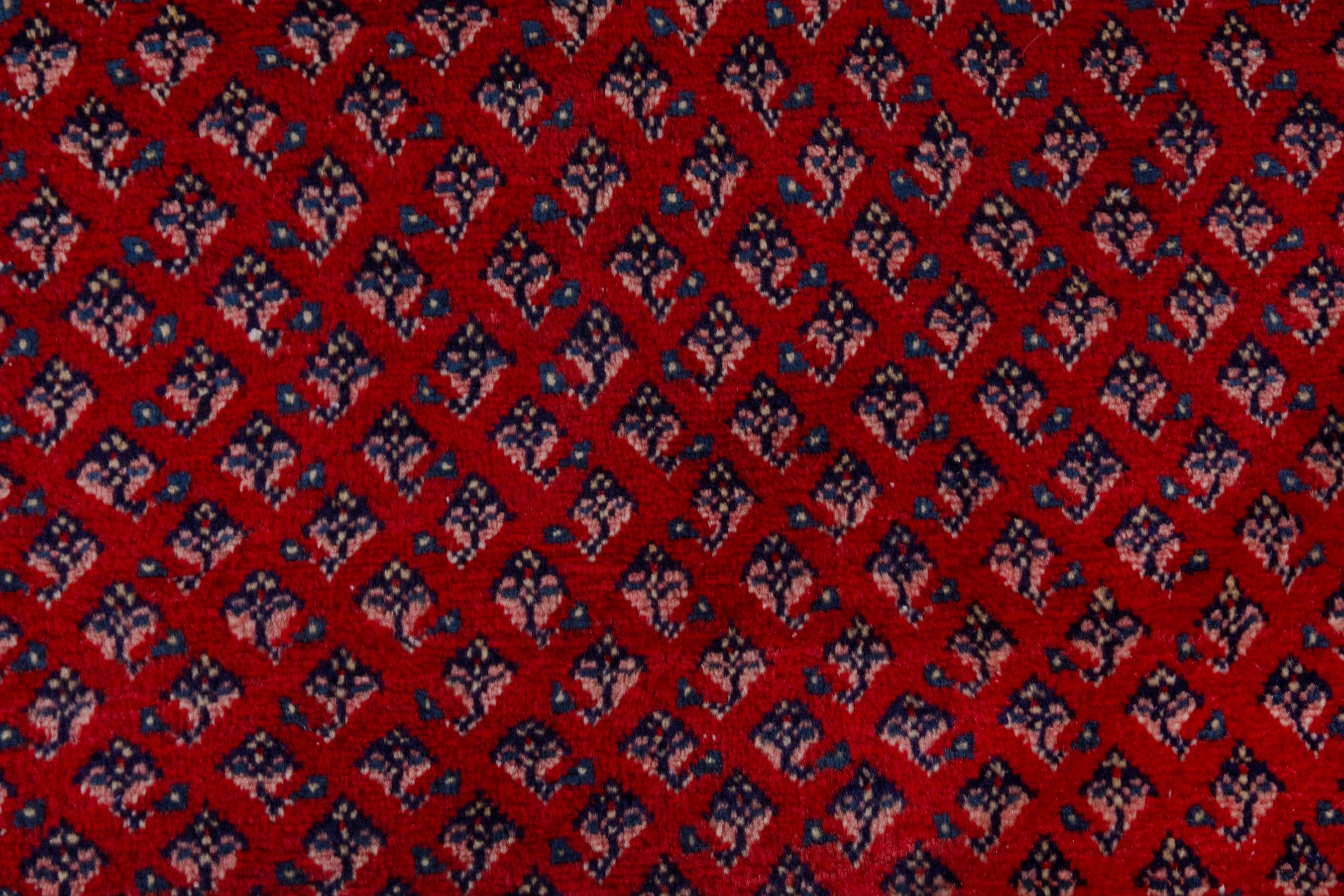 Persian Arak oversized rug in burgundy and rust, view 14 of 22