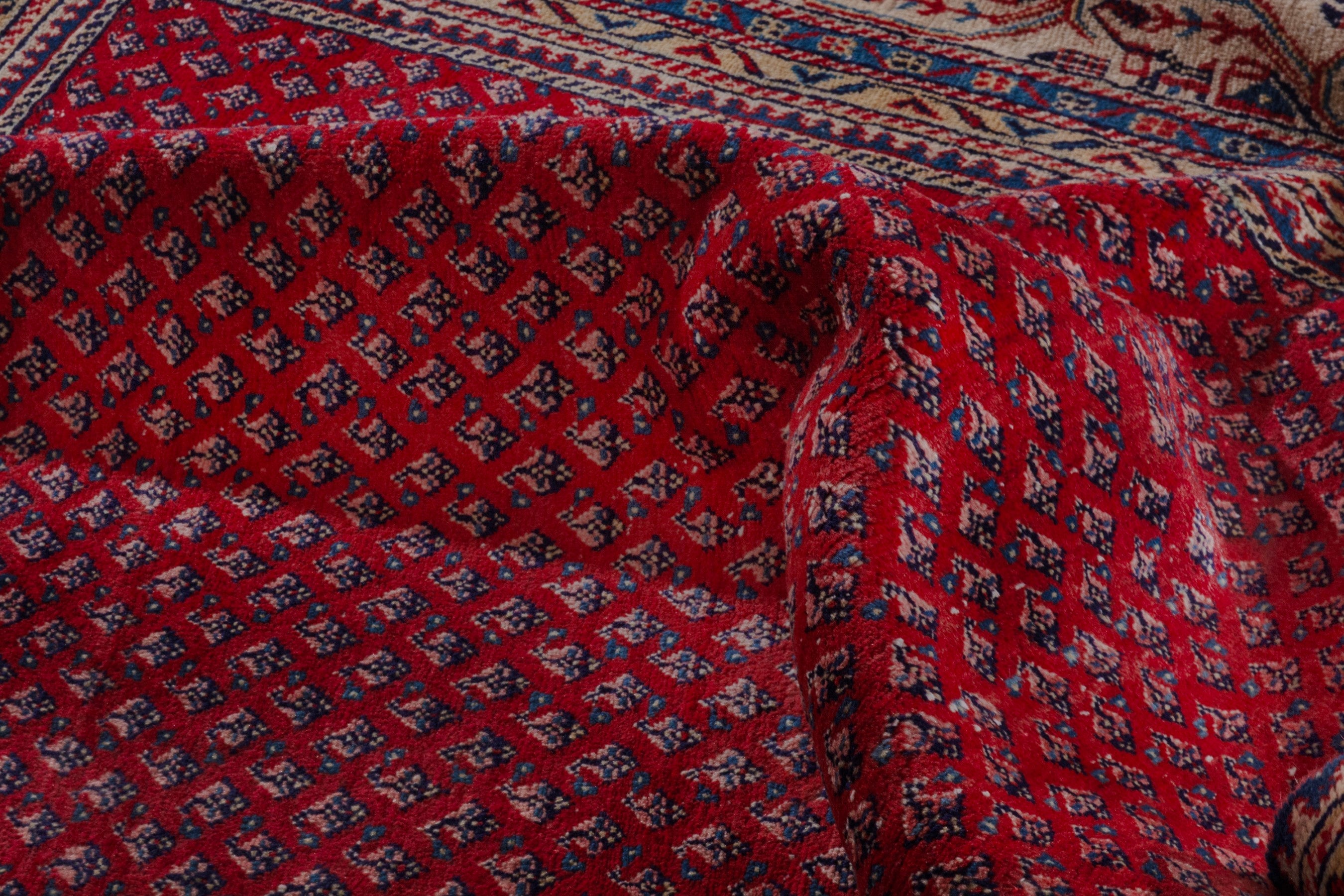 Persian Arak oversized rug in burgundy and rust, view 19 of 22