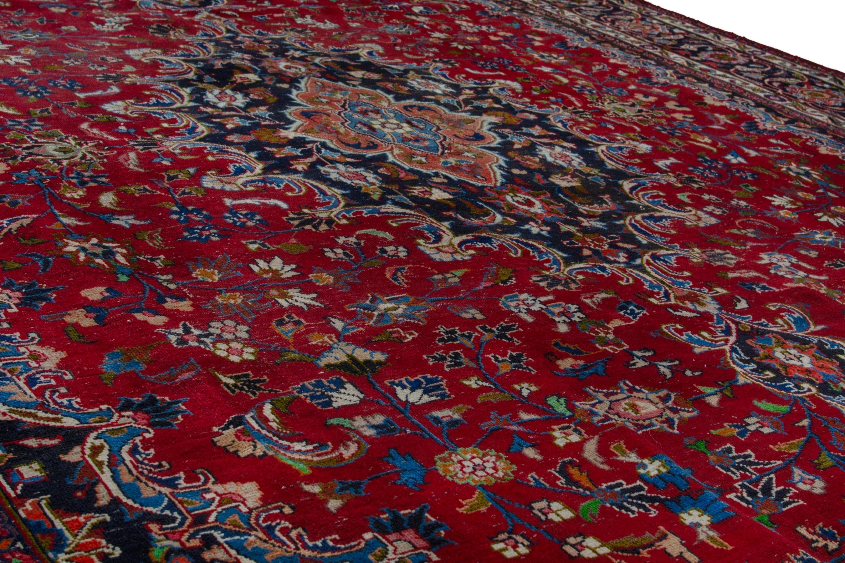 Persian Mashhad oversized rug in deep red and dark brown, view 9 of 19