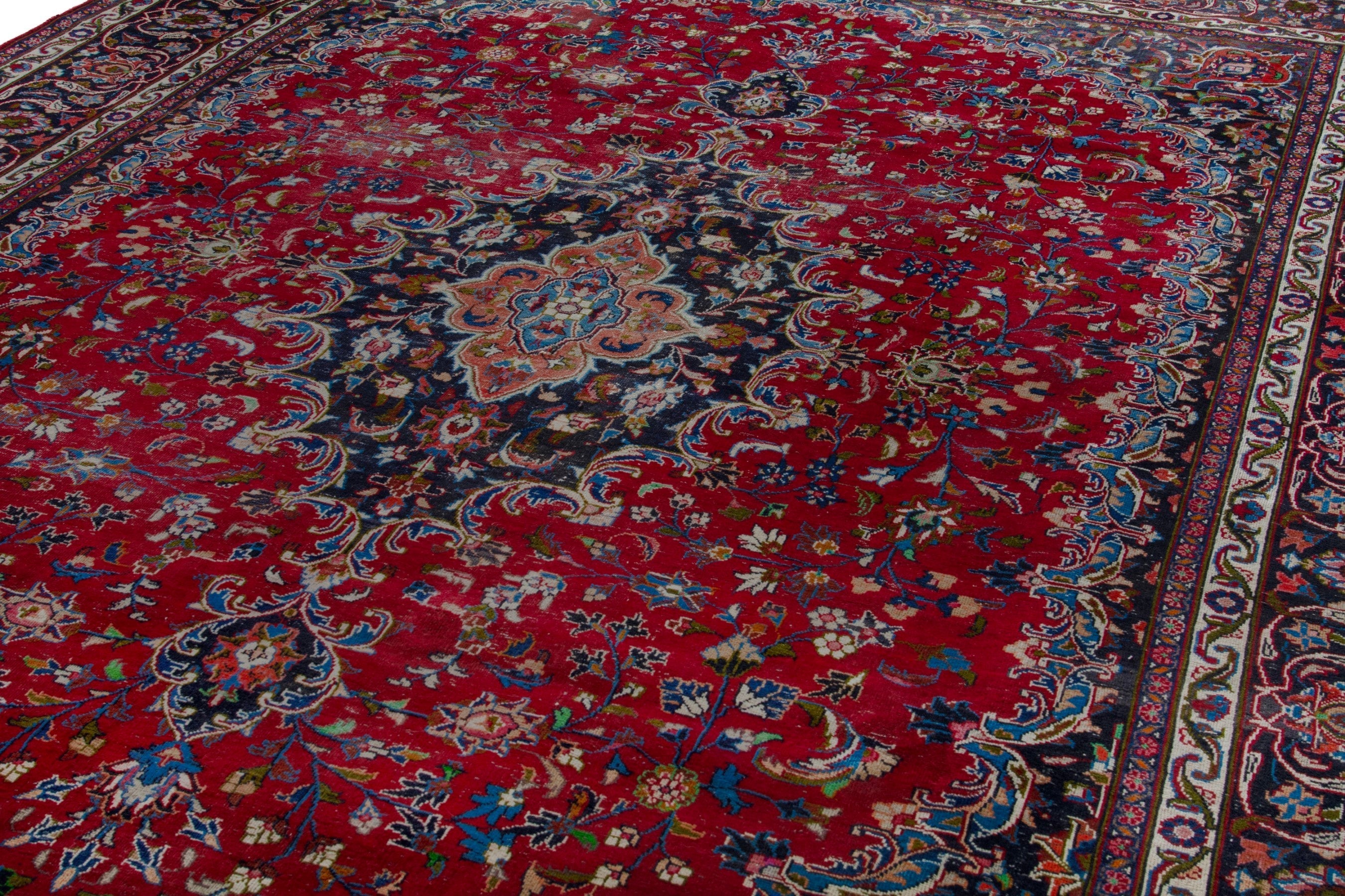 Persian Mashhad oversized rug in deep red and dark brown, view 8 of 19