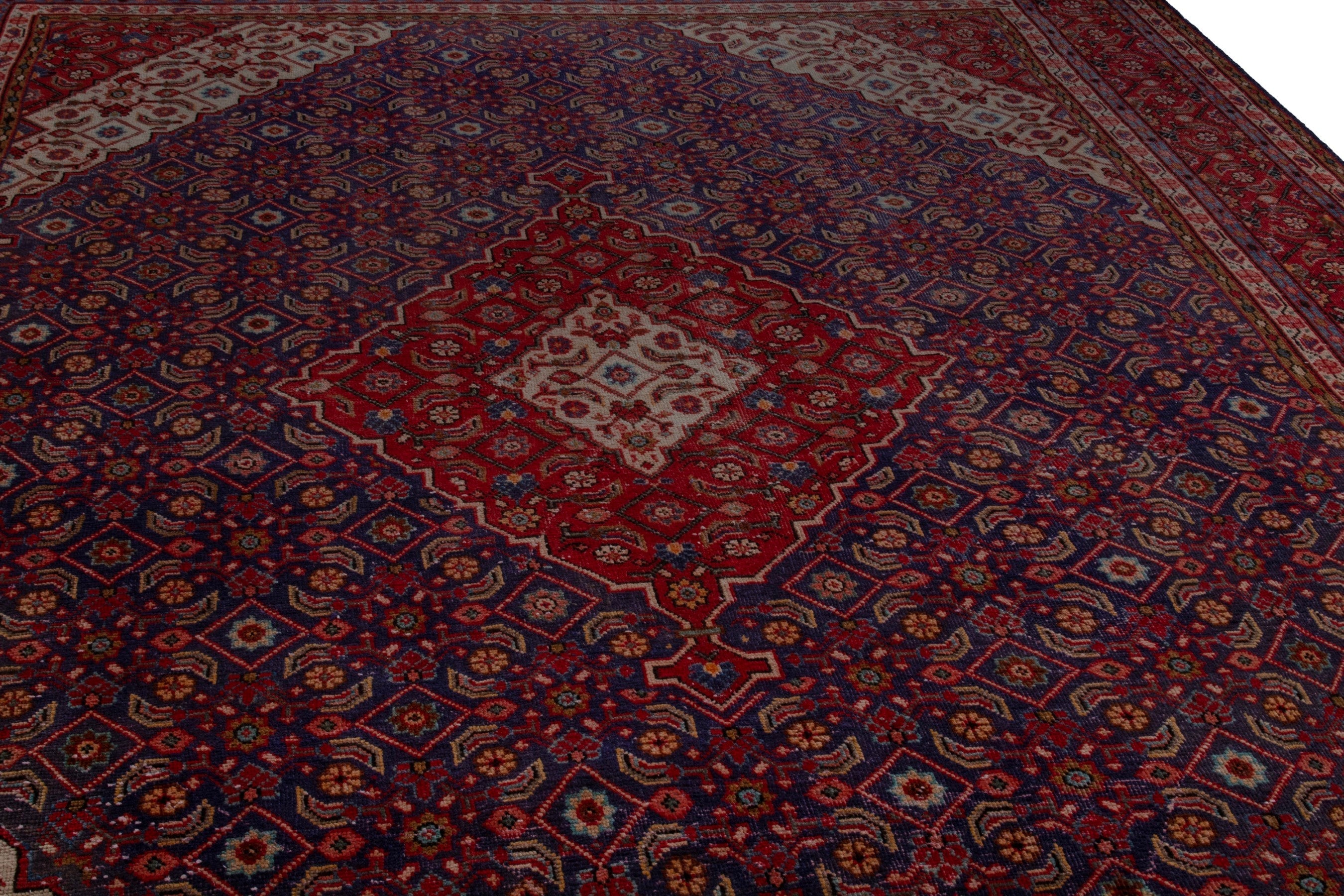 Persian Mahal oversized rug in navy and burgundy, view 8 of 22