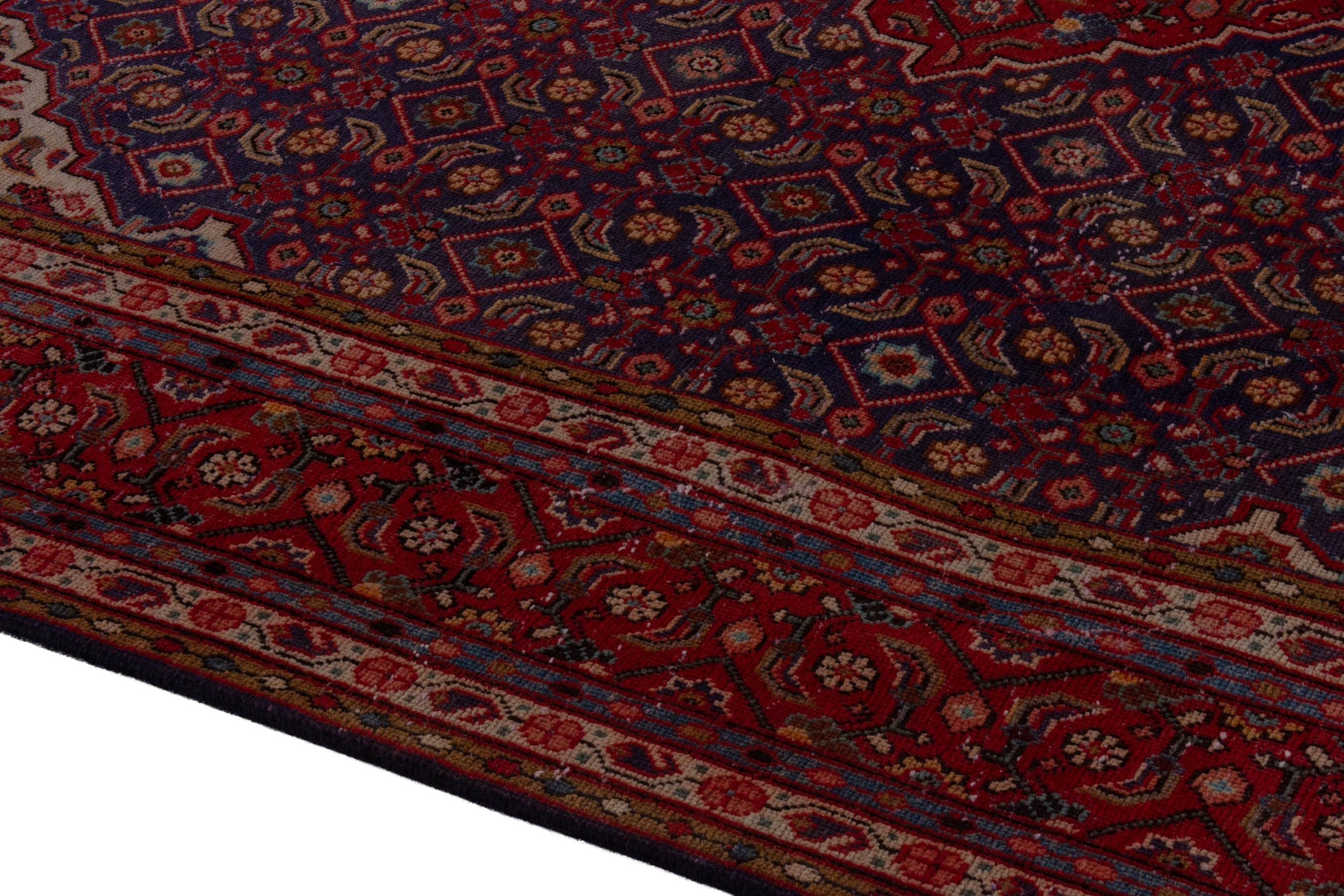 Persian Mahal oversized rug in navy and burgundy, view 6 of 22