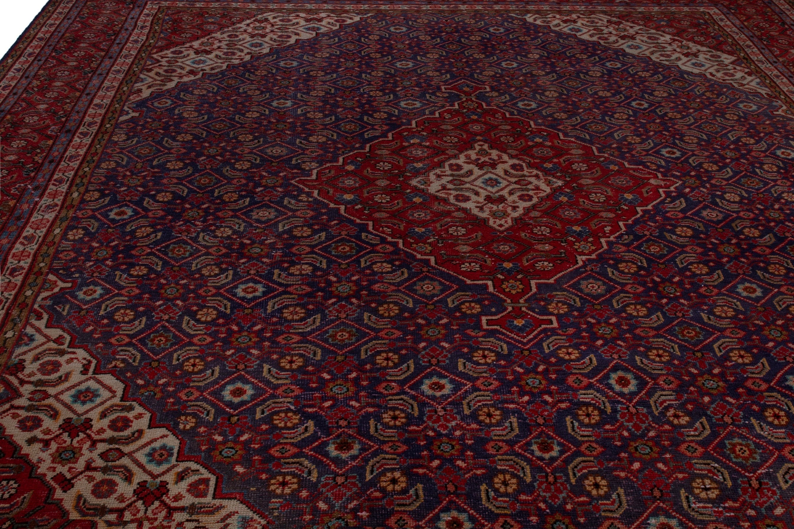 Persian Mahal oversized rug in navy and burgundy, view 7 of 22