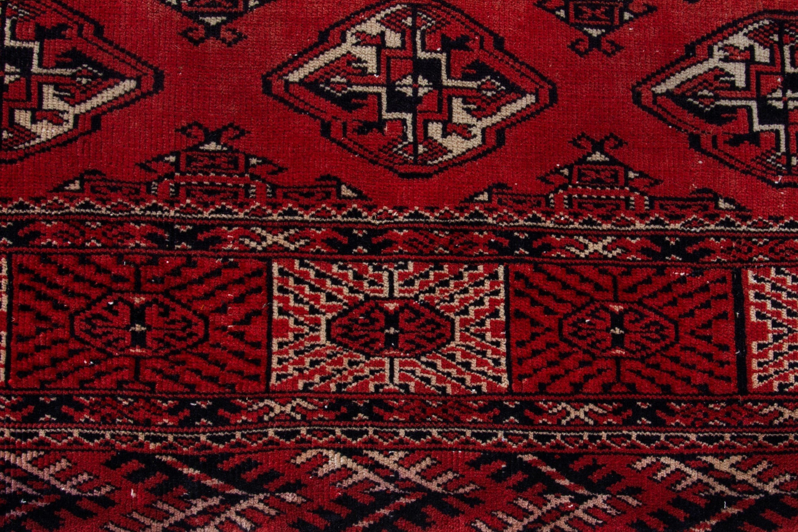 Persian Torkaman area rug in deep red and burgundy, view 11 of 18