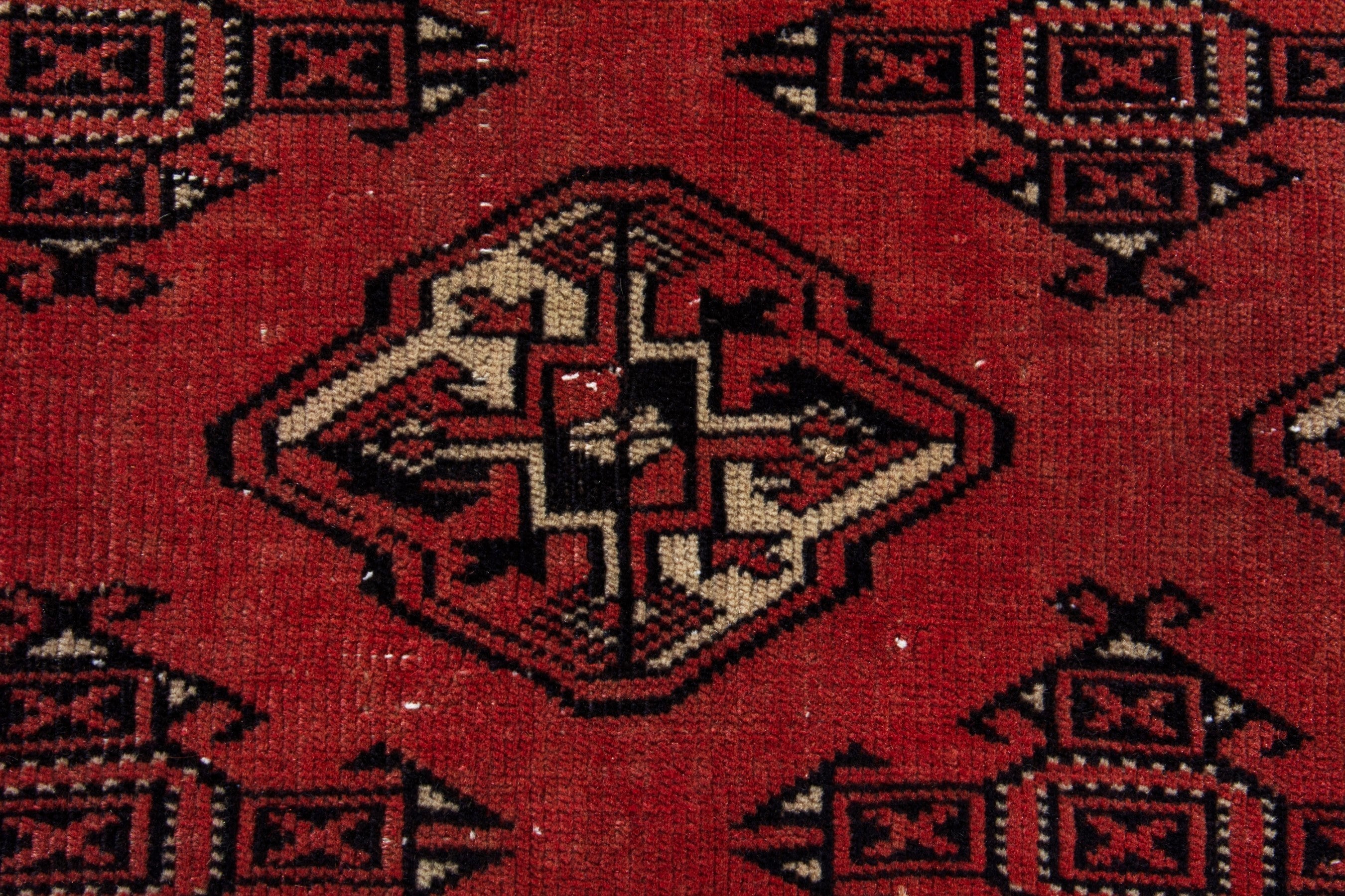 Persian Torkaman area rug in deep red and burgundy, view 12 of 18