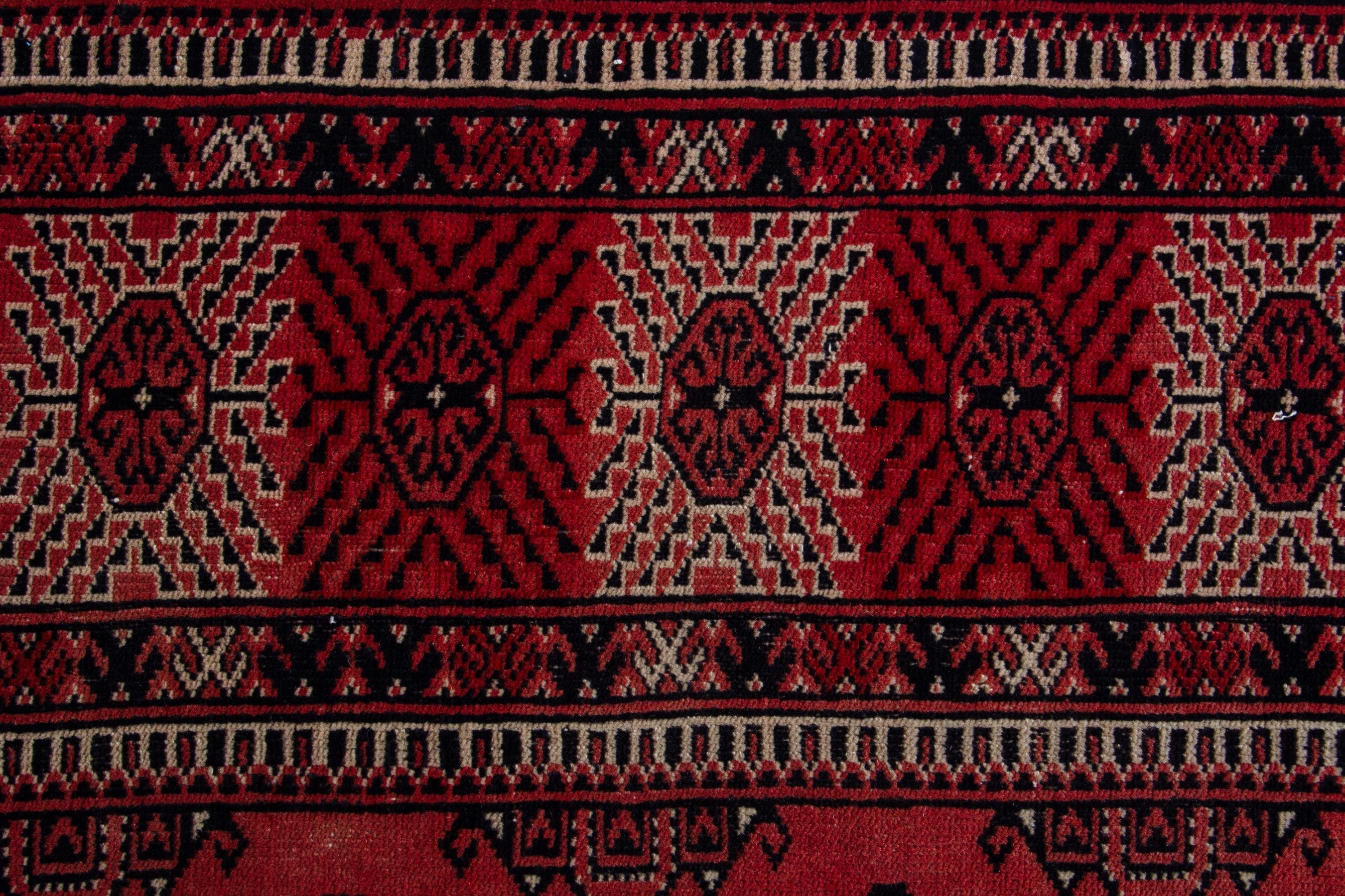 Persian Torkaman area rug in deep red and burgundy, view 14 of 18