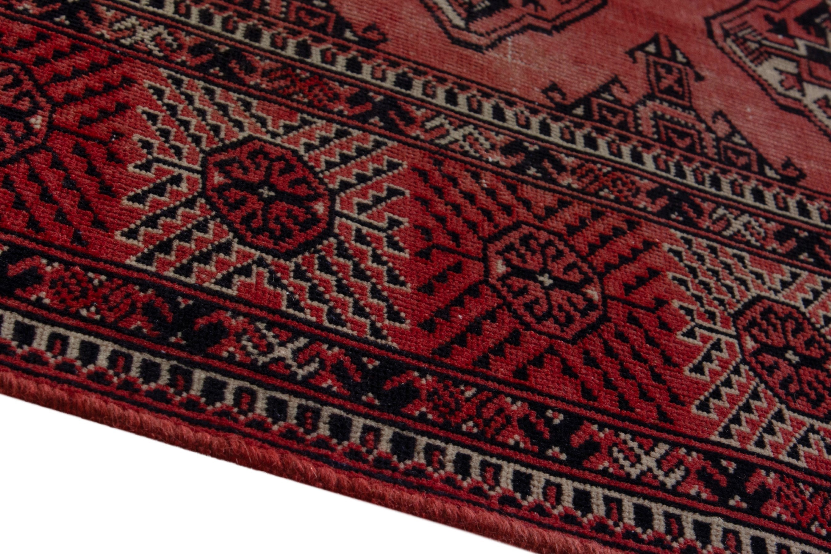 Persian Torkaman area rug in deep red and burgundy, view 7 of 18