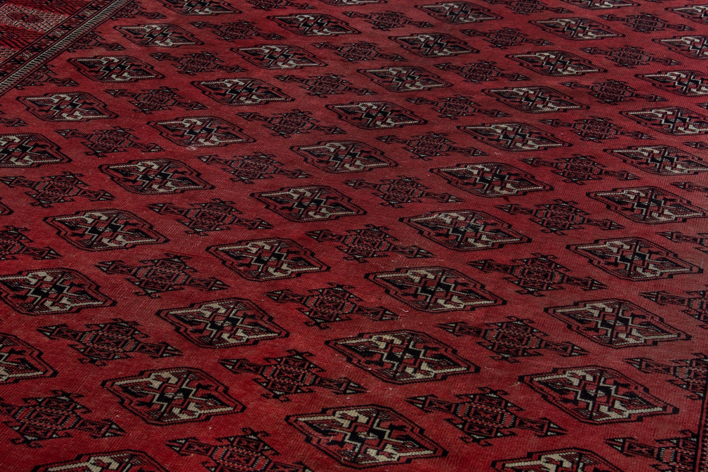 Persian Torkaman area rug in deep red and burgundy, view 8 of 18