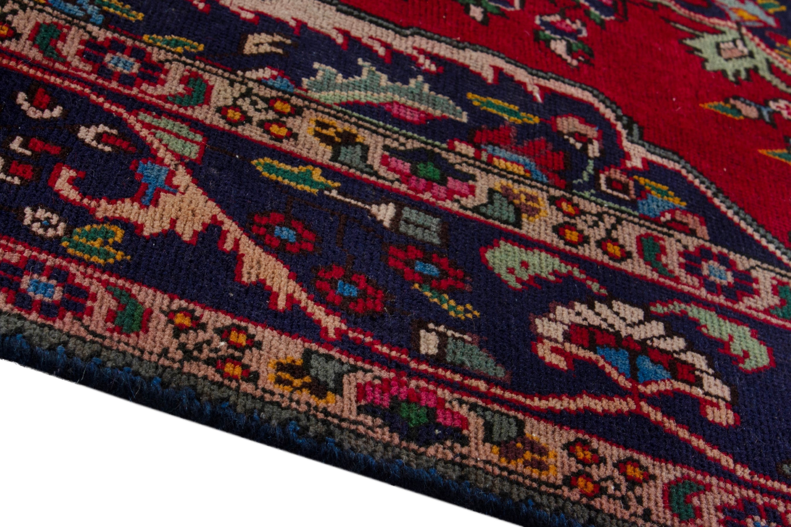 Persian Tabriz area rug in deep red and burgundy, view 5 of 20