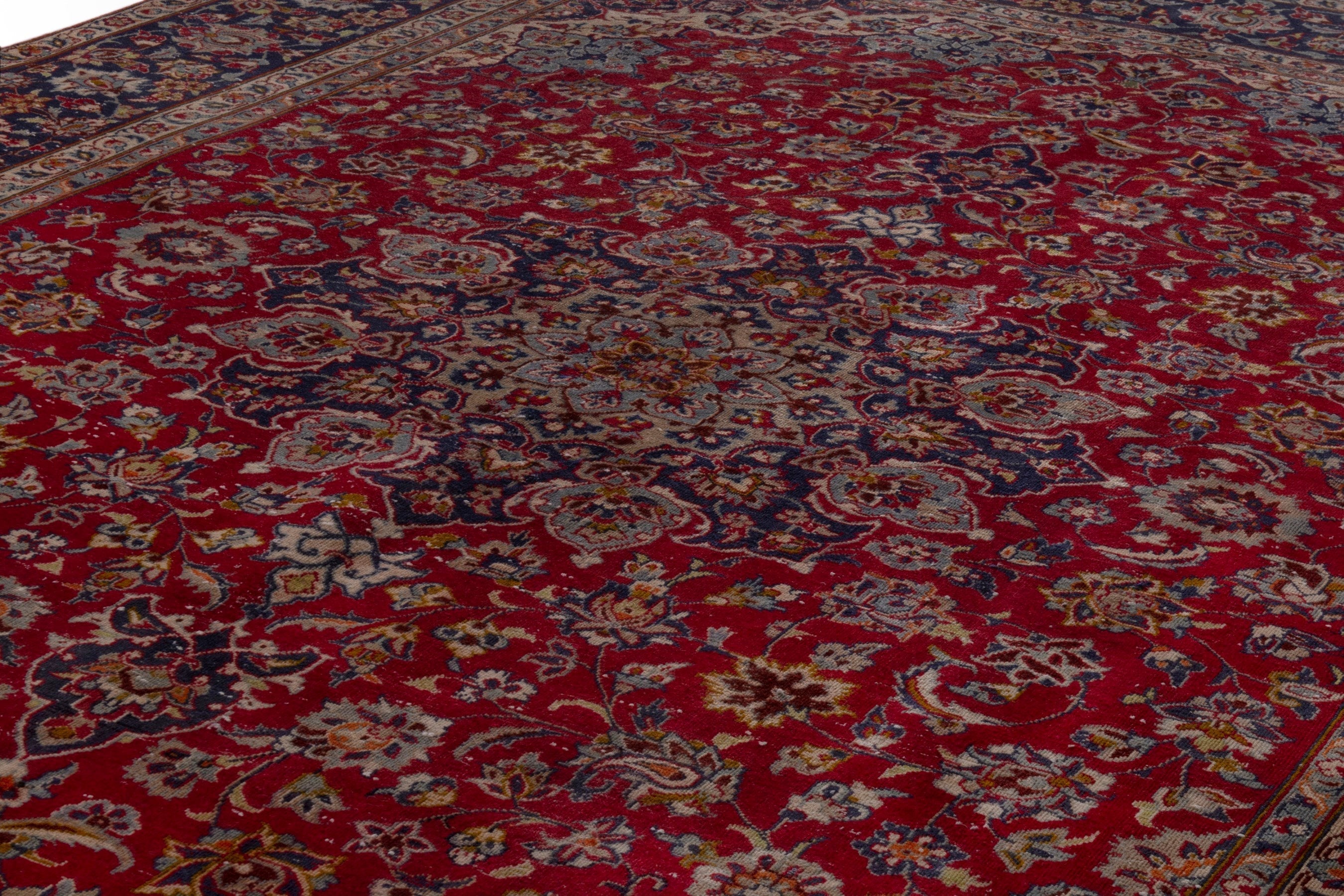 Persian Najafabad oversized rug in deep red and navy, view 8 of 18