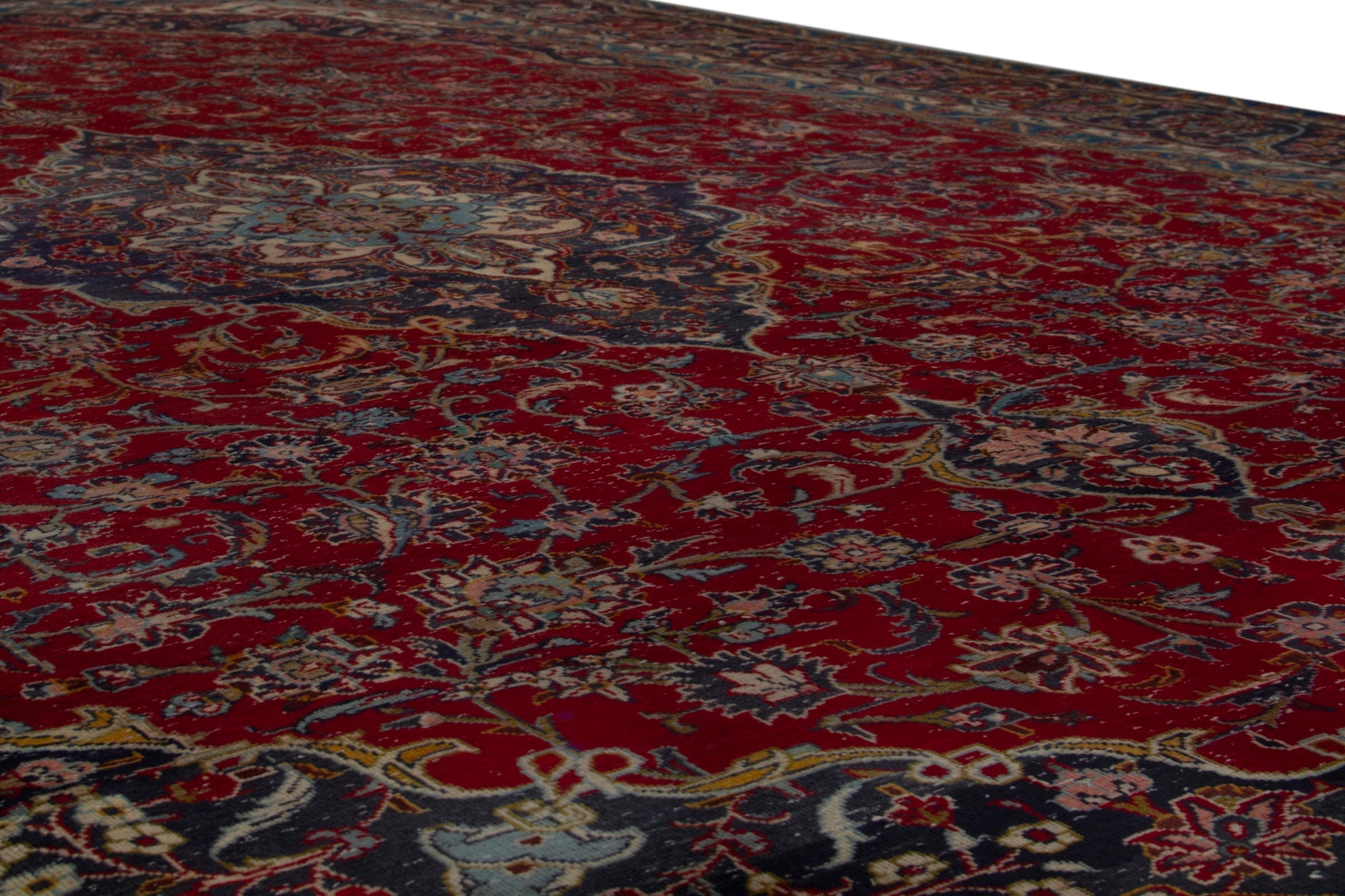 Persian Kashan oversized rug in deep red and dark blue, view 8 of 18