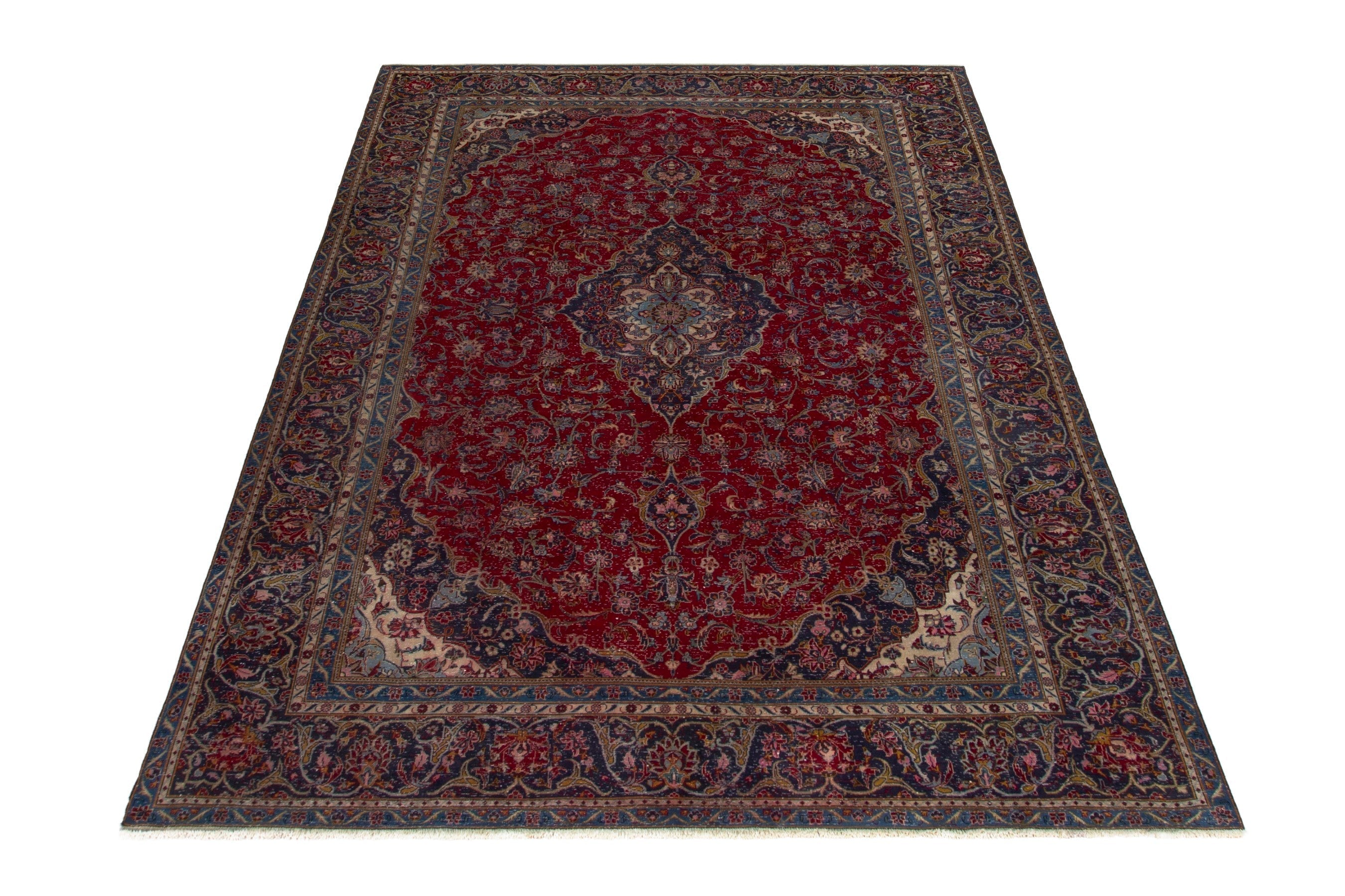 Persian Kashan oversized rug in deep red and dark blue, view 2 of 18