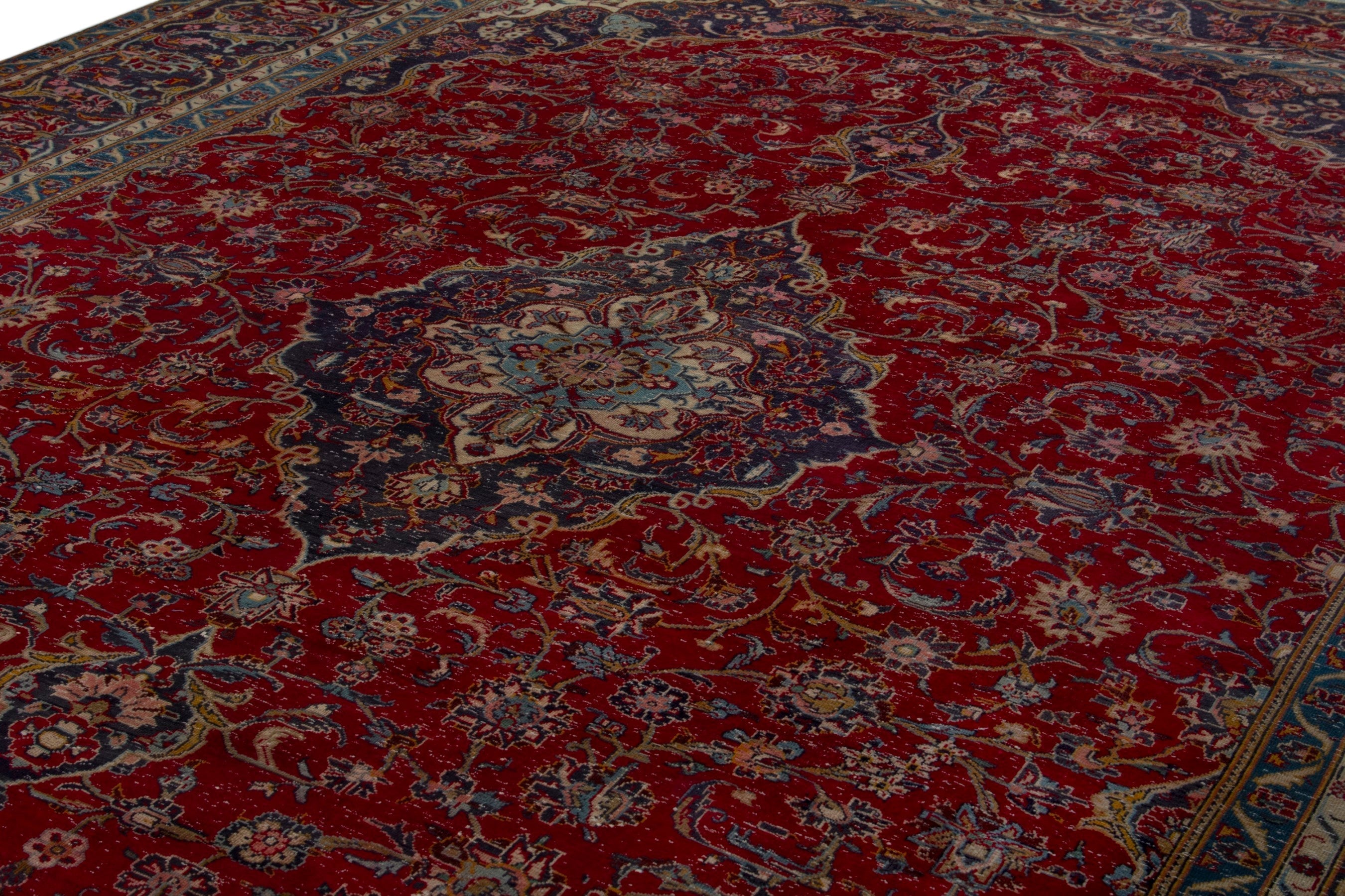 Persian Kashan oversized rug in deep red and dark blue, view 7 of 18