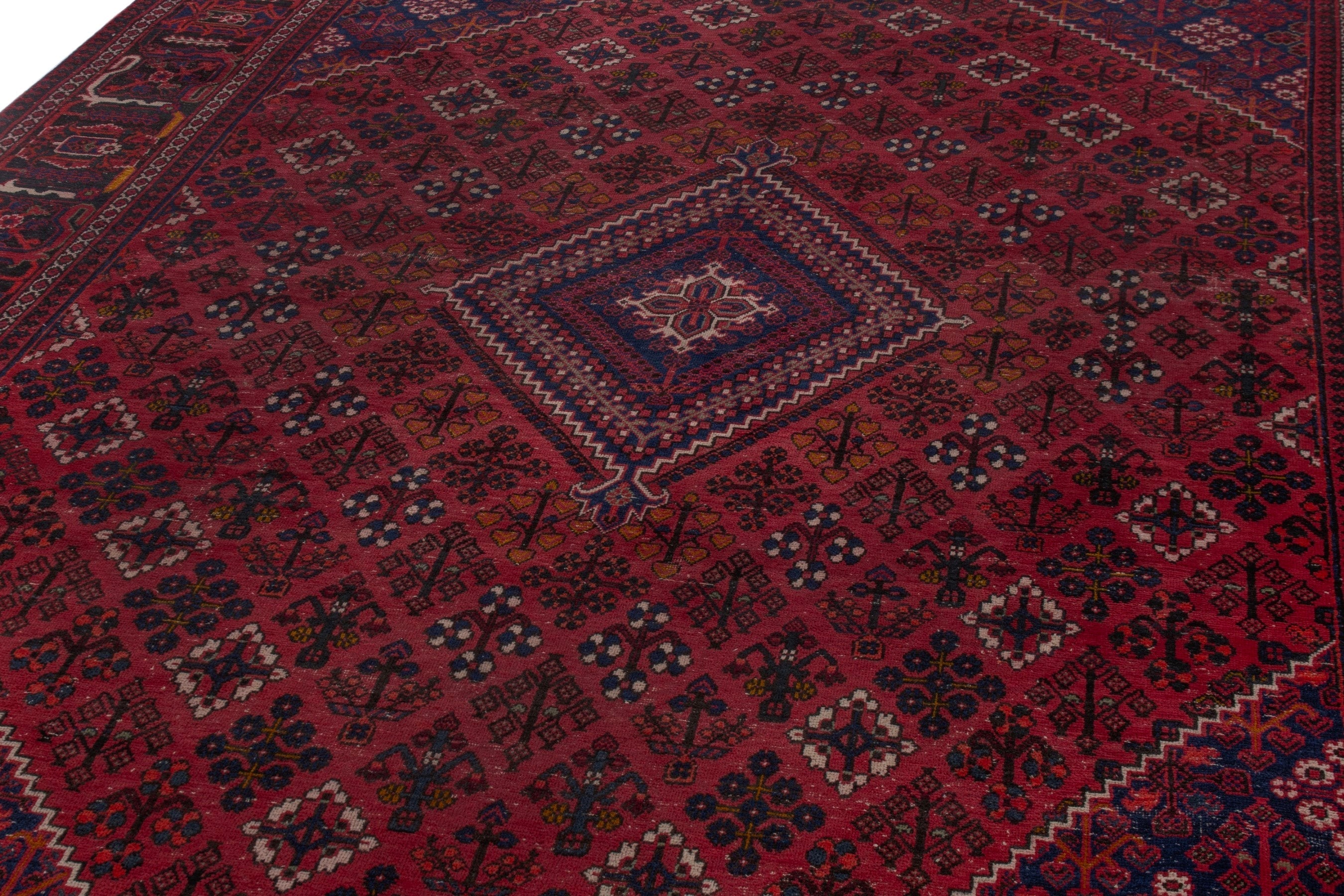 Persian Joshaghan oversized rug in burgundy and deep red, view 7 of 22