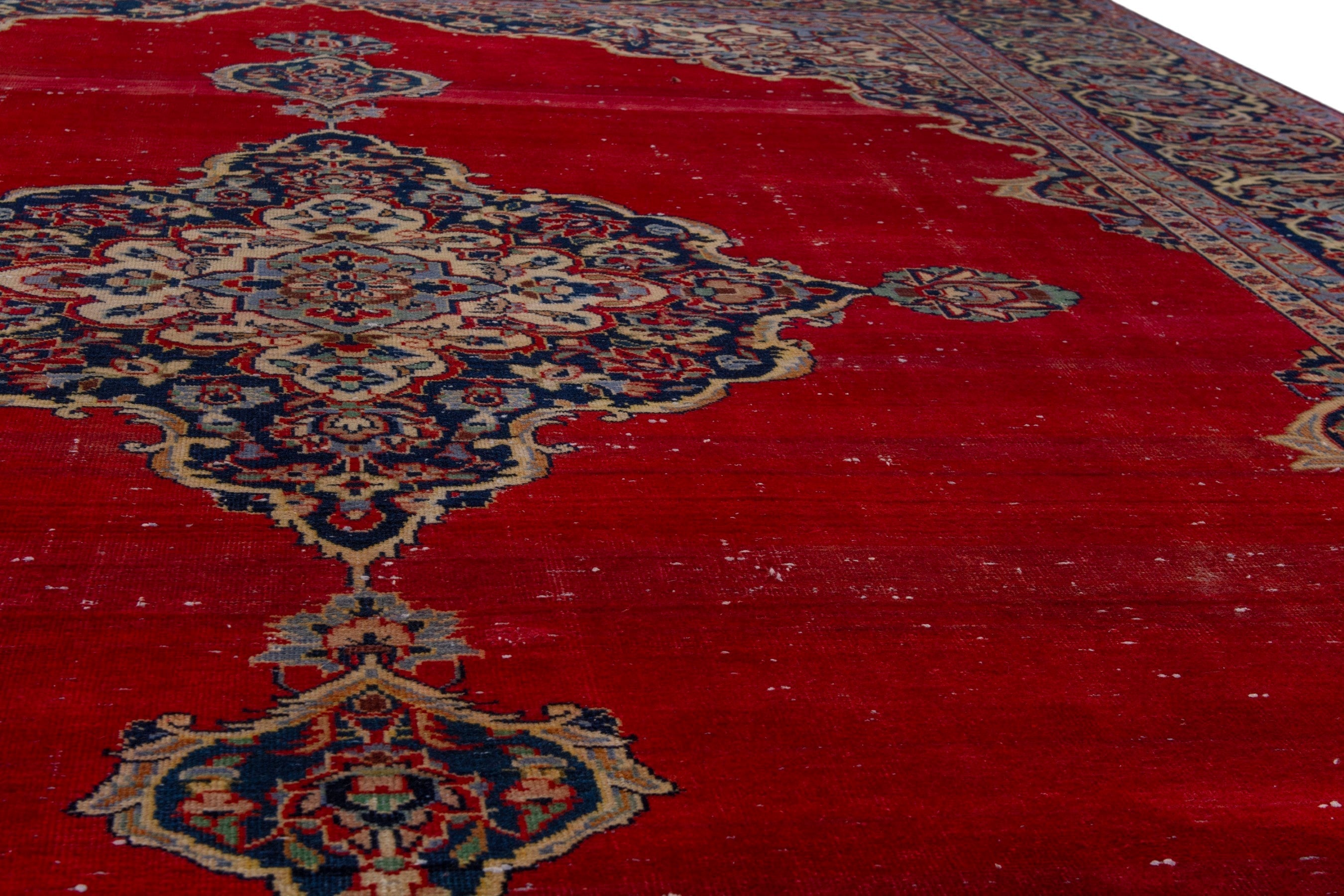Persian Kashan oversized rug in deep red and burgundy, view 9 of 23