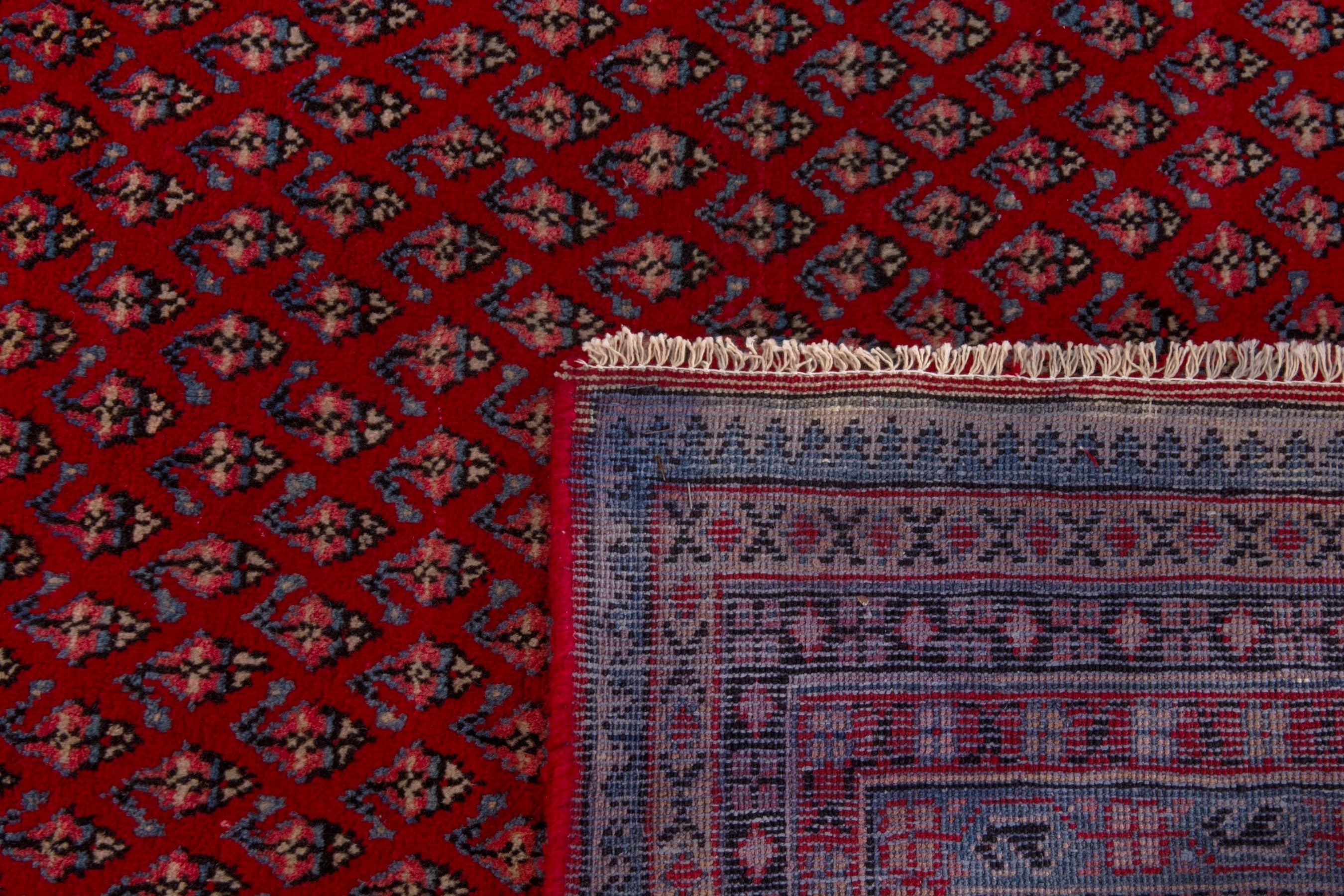 Persian Arak oversized rug in deep red and rust, view 11 of 20