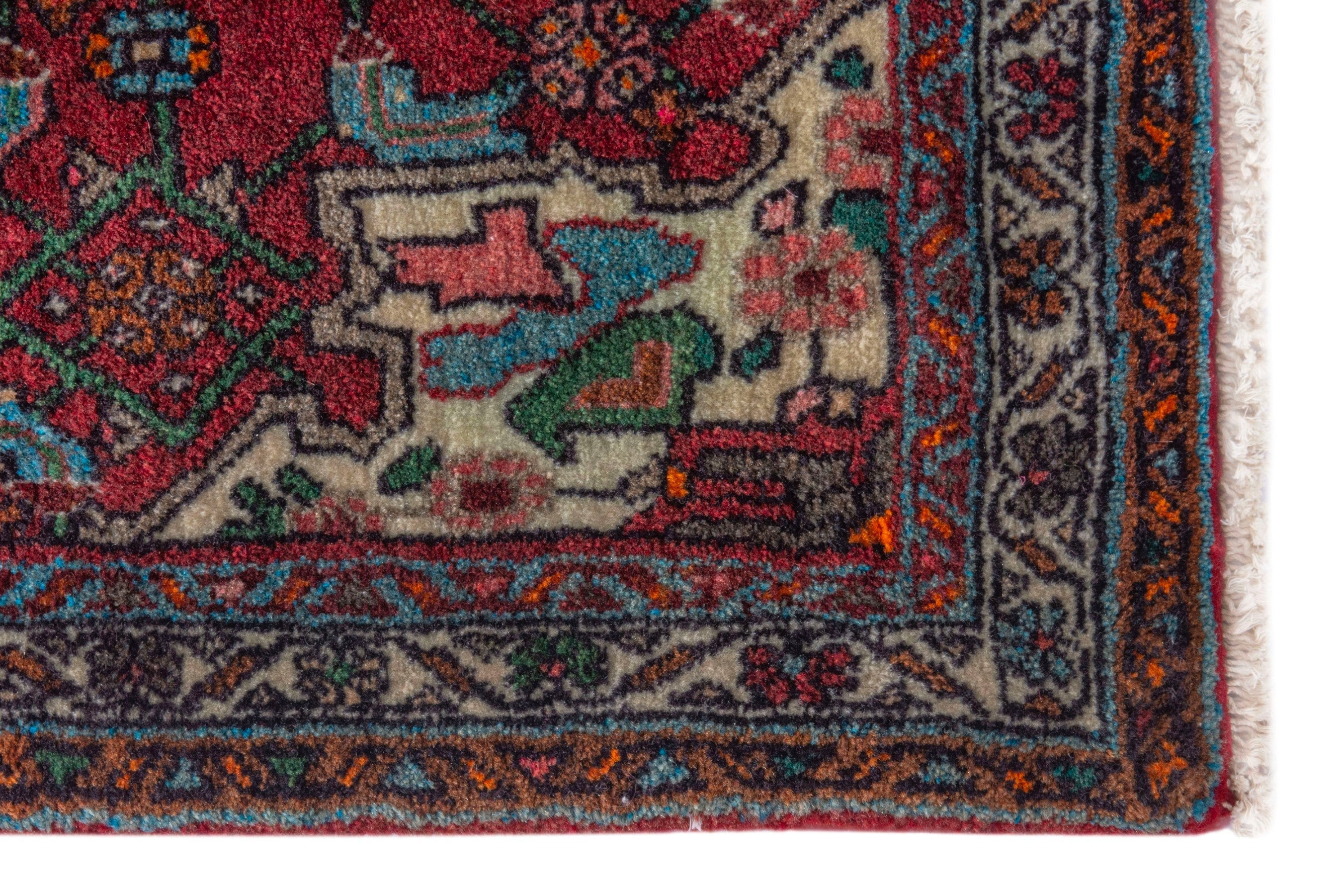 Persian Bijar accent rug in deep red and off-white, view 5 of 9