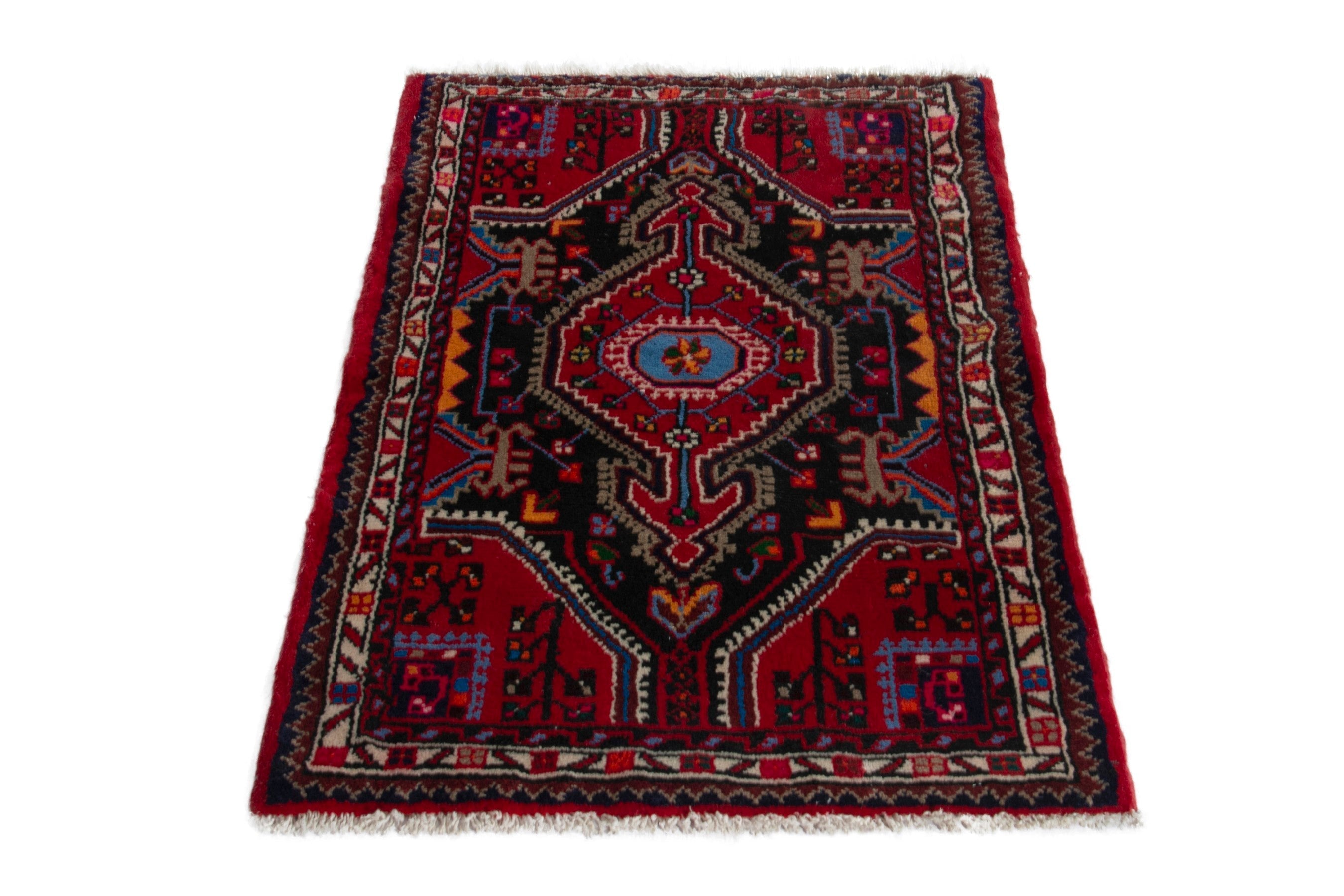Persian Toyserkan accent rug in deep red and burgundy, view 2 of 9