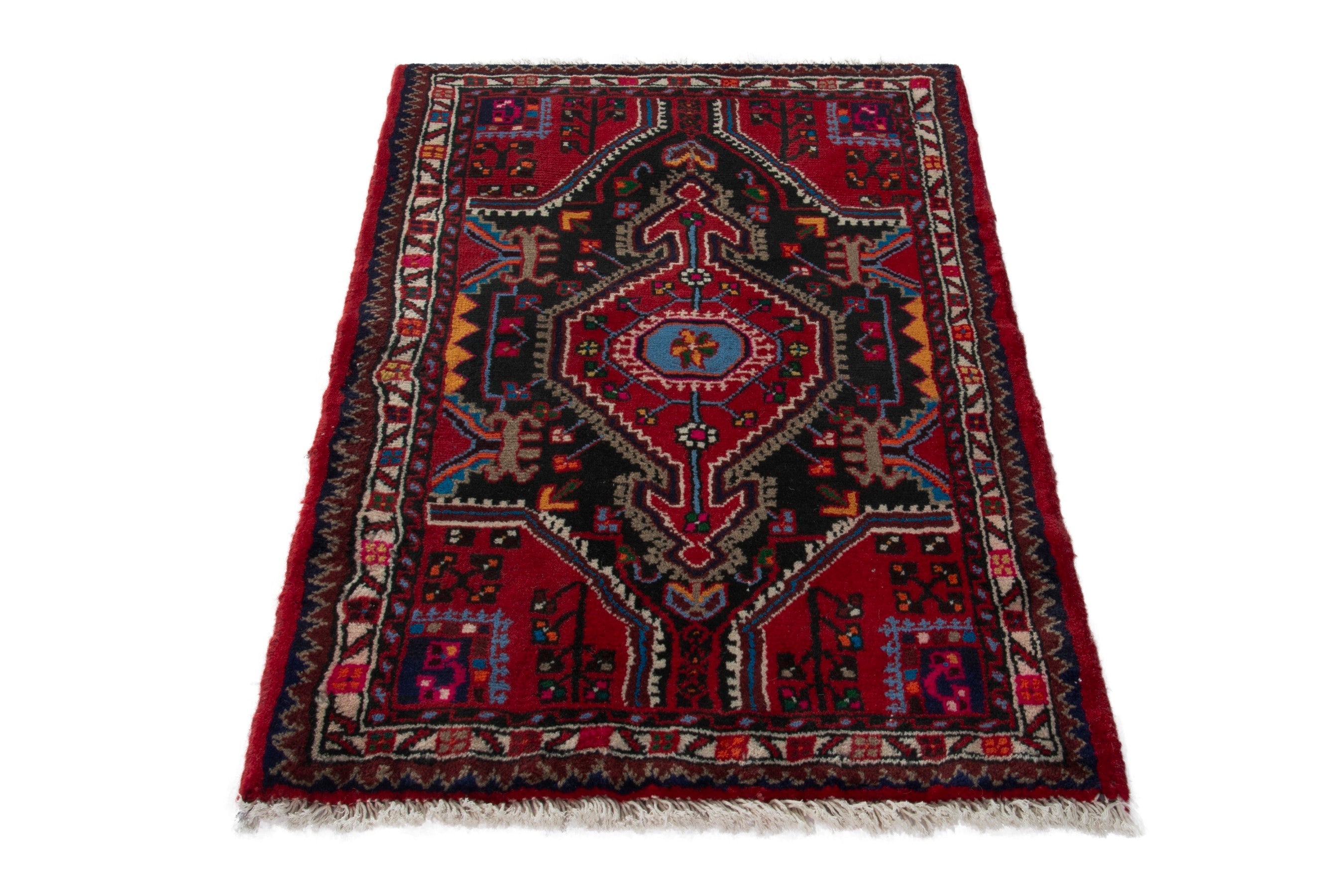 Persian Toyserkan accent rug in deep red and burgundy, view 3 of 9