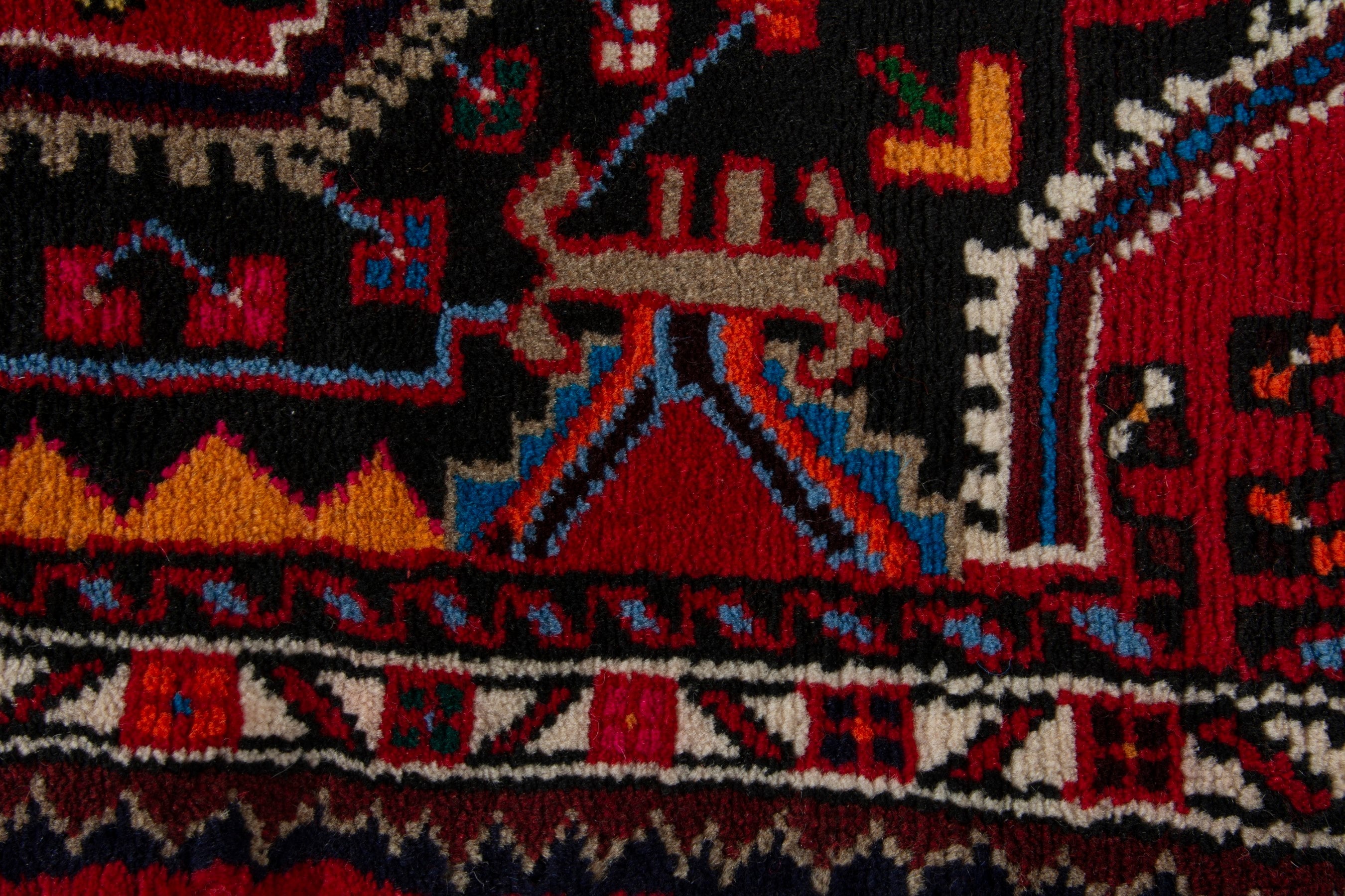 Persian Toyserkan accent rug in deep red and burgundy, view 7 of 9