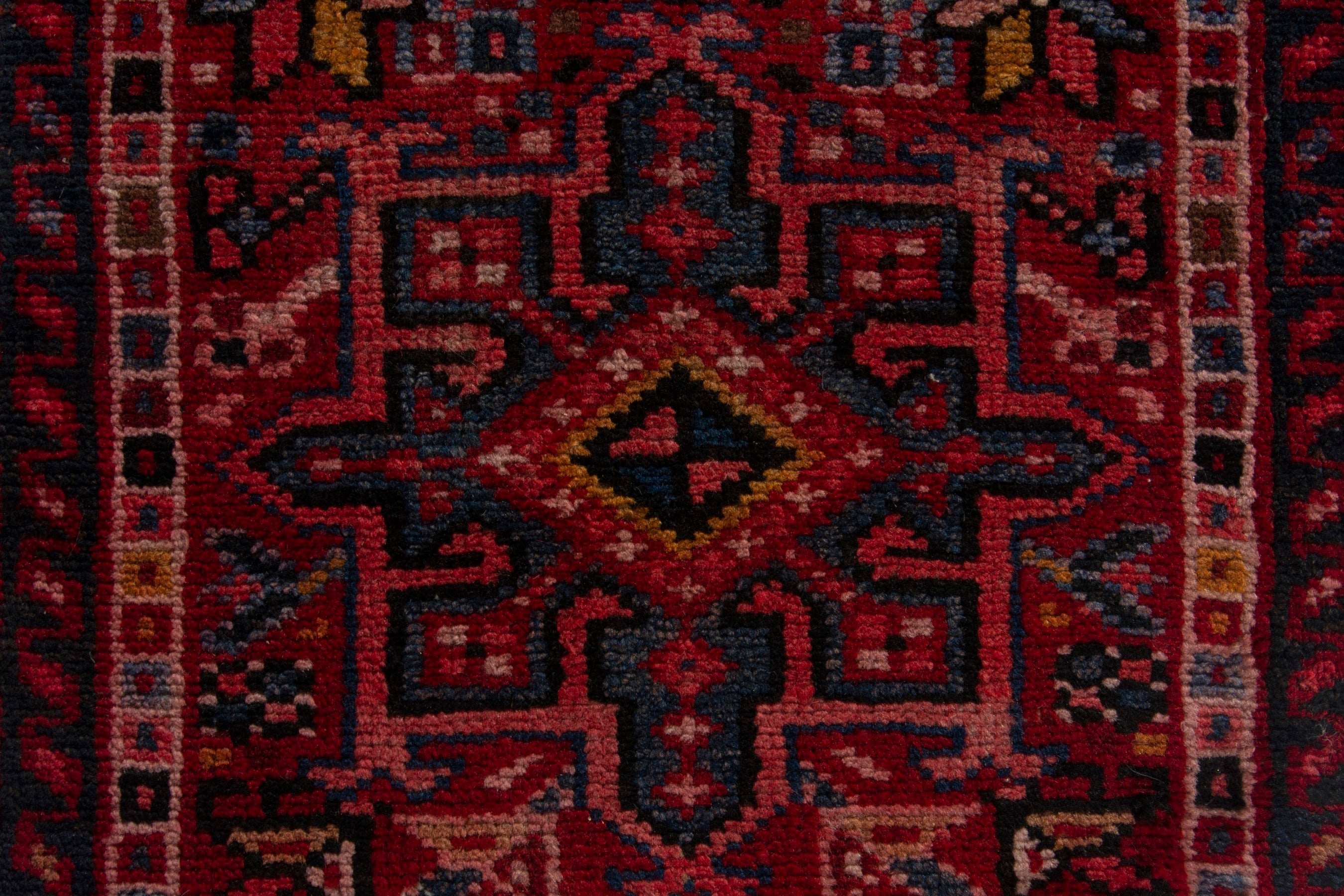 Persian Gharajeh accent rug in deep red and burgundy, view 6 of 8