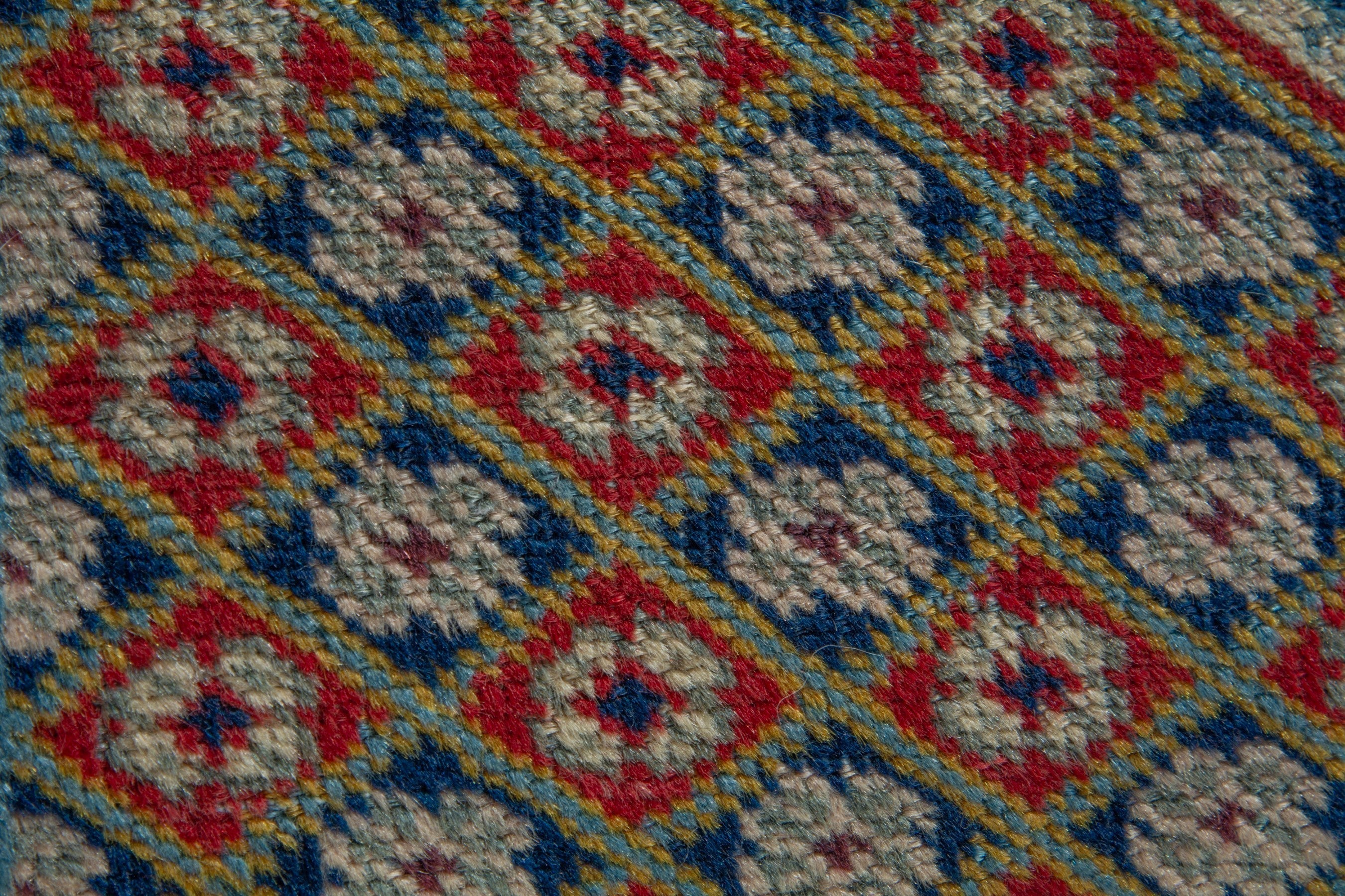Persian Ardabil accent rug in terracotta and navy, view 6 of 8
