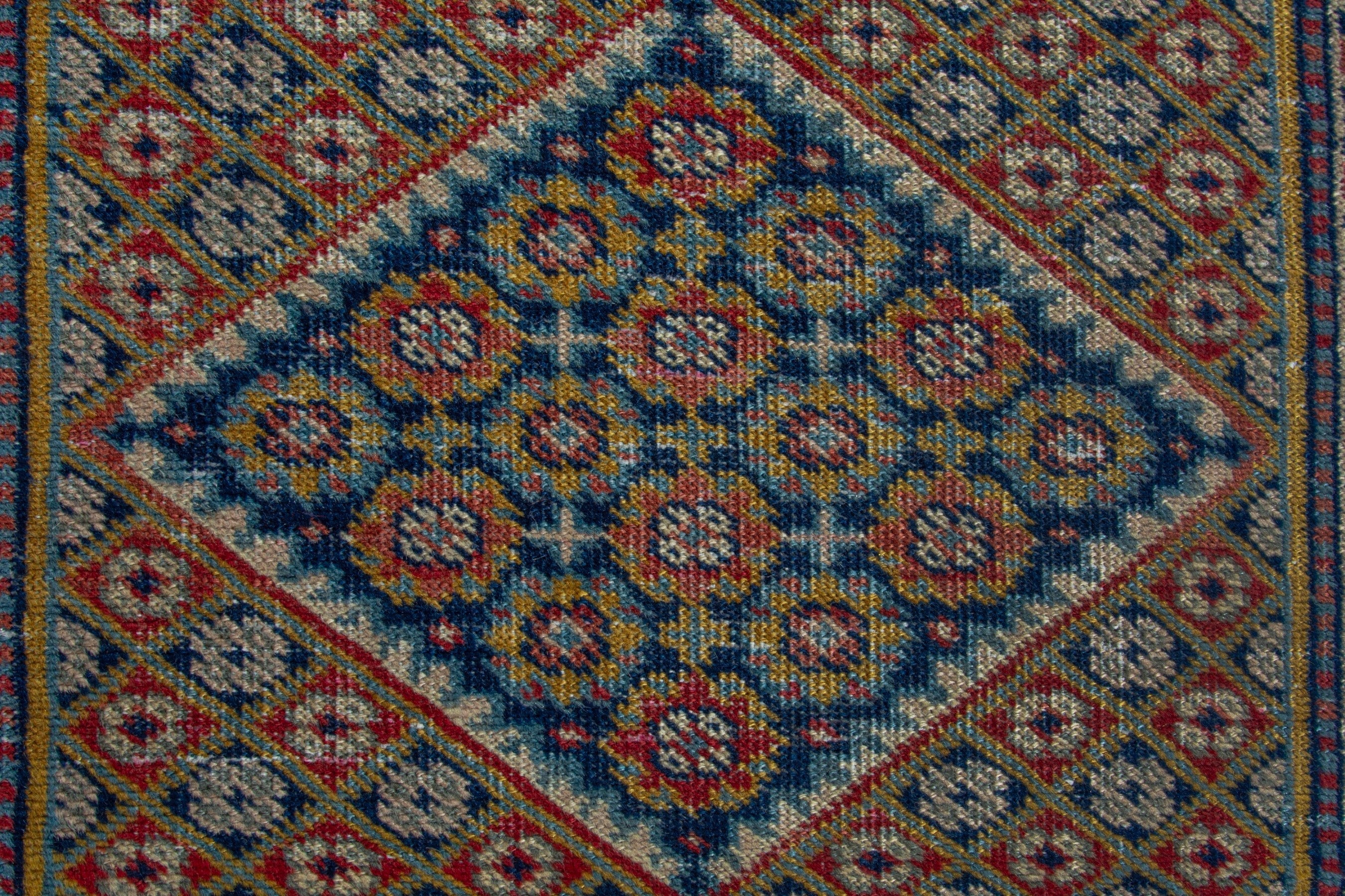 Persian Ardabil accent rug in terracotta and navy, view 7 of 8