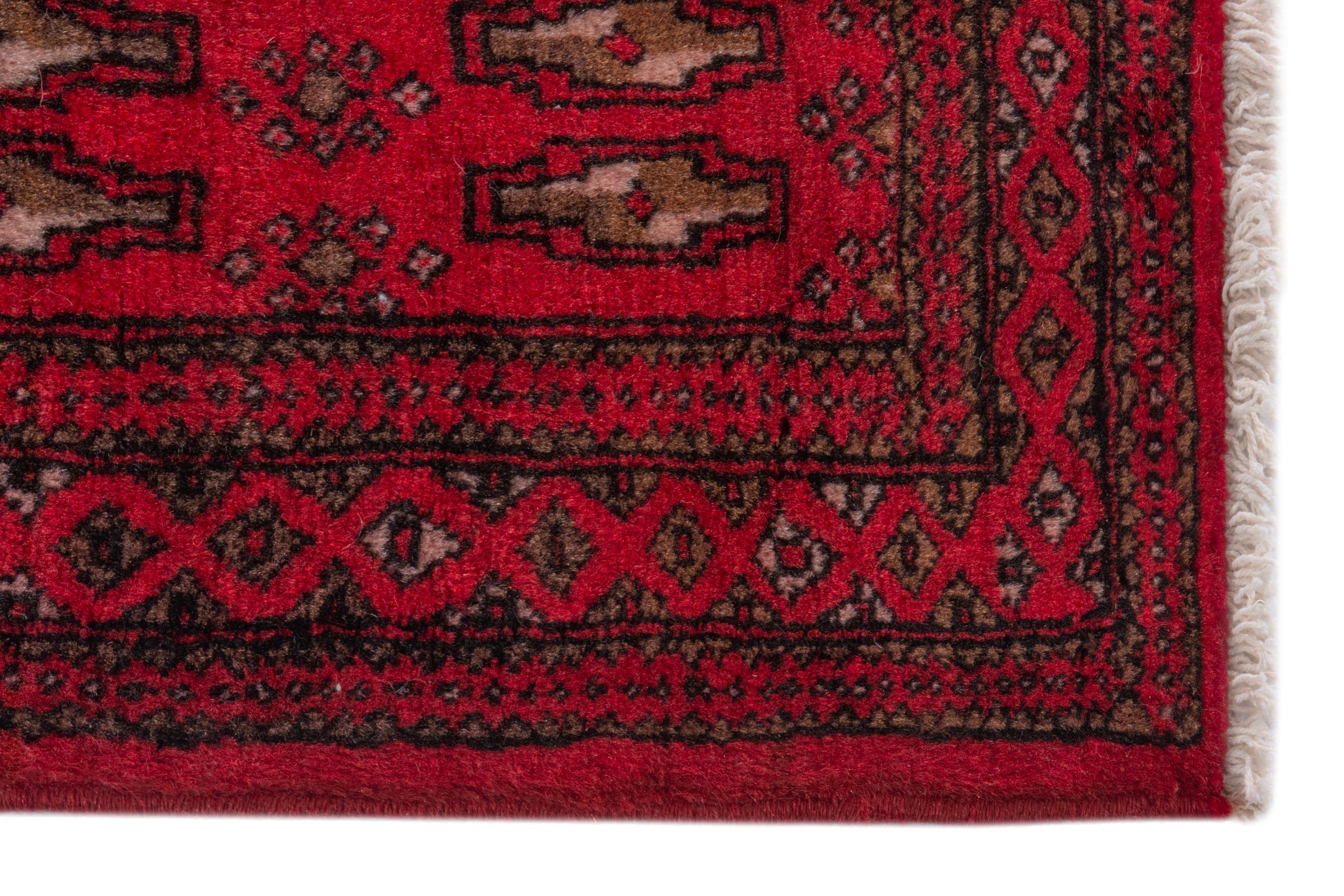 Persian Torkaman accent rug in deep red and burgundy, view 5 of 7