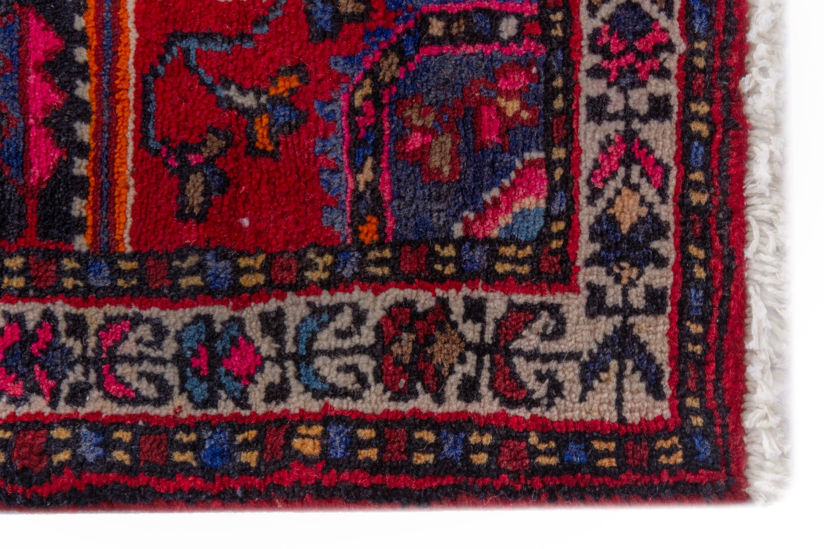 Persian Toyserkan accent rug in navy and deep red, view 5 of 7