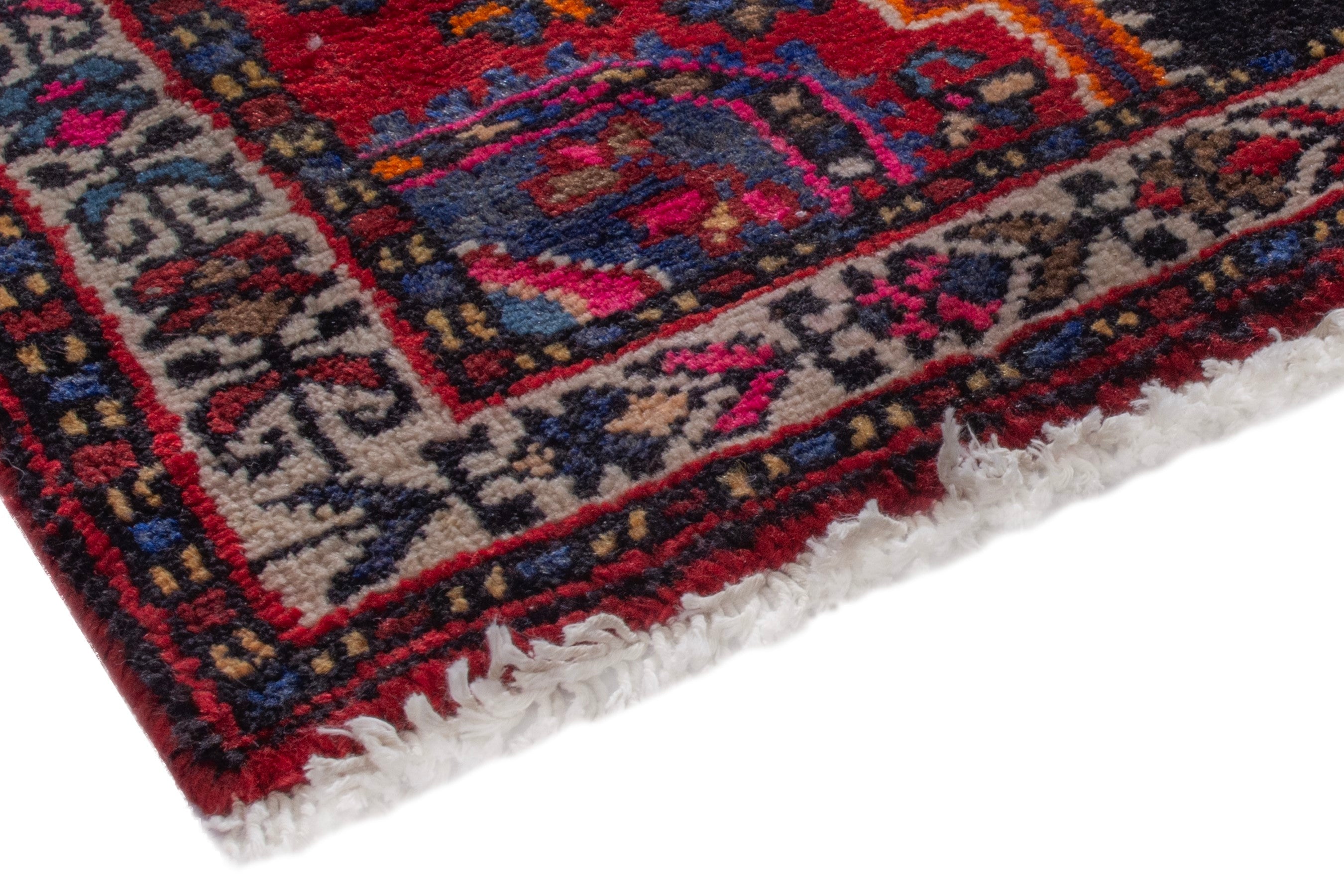 Persian Toyserkan accent rug in navy and deep red, view 4 of 7