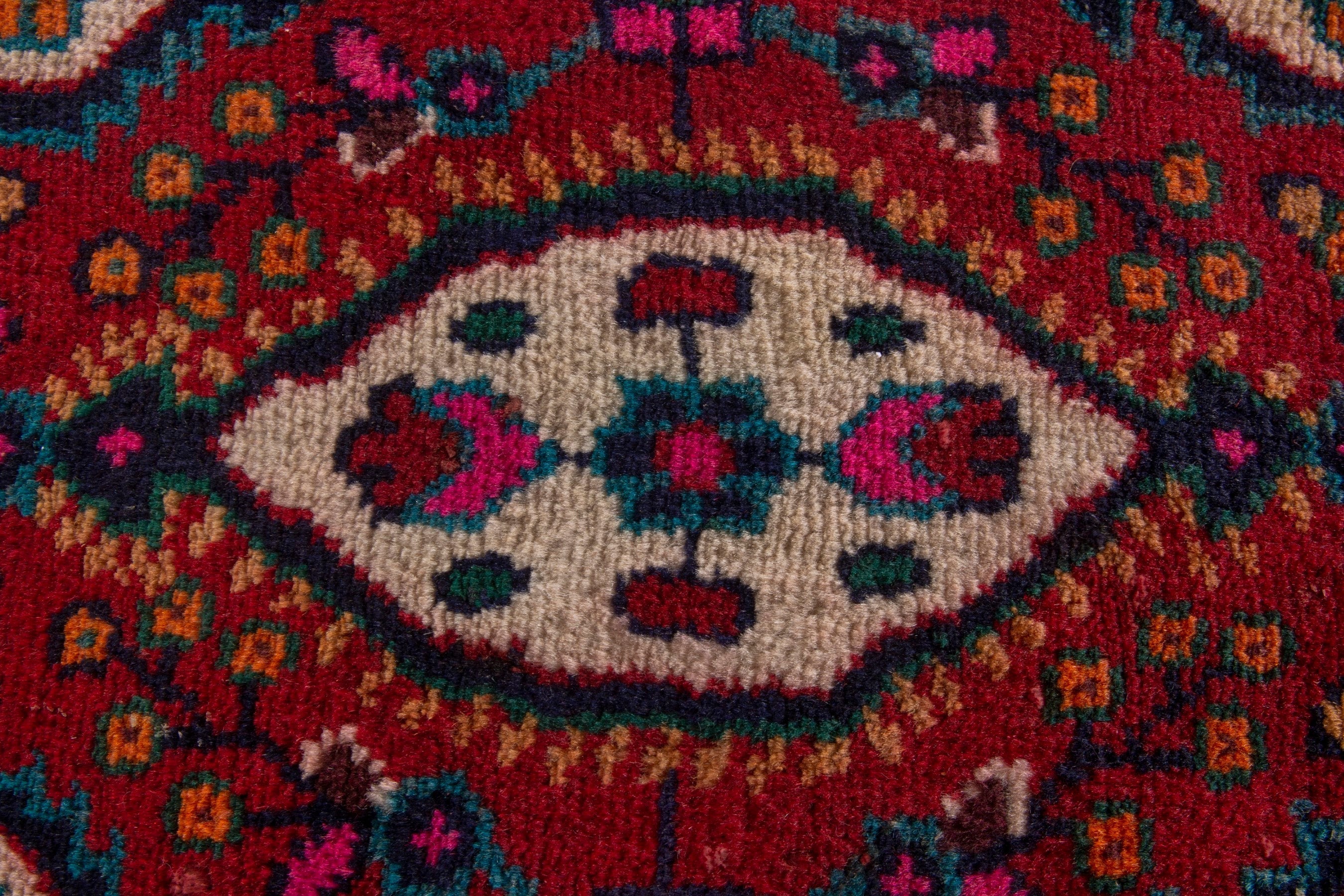 Persian Hamedan accent rug in deep red and navy, view 6 of 7
