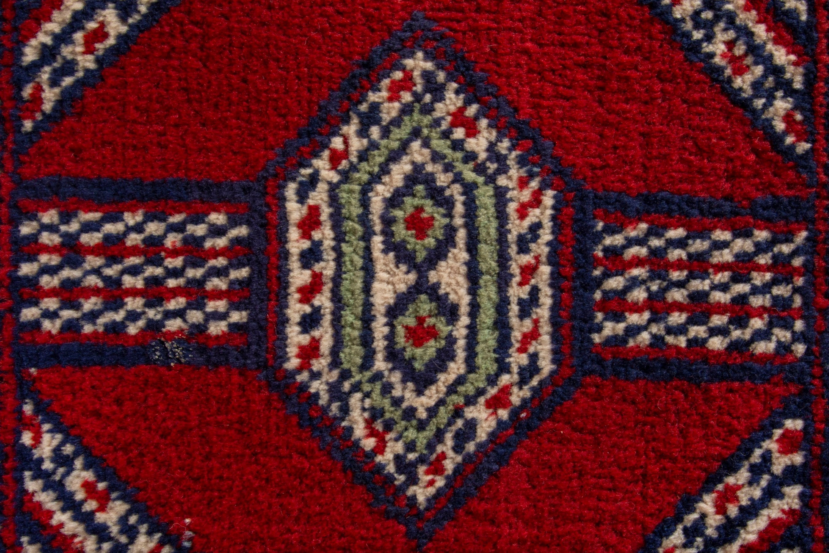 Persian Torkaman accent rug in deep red and burgundy, view 8 of 9